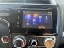 2016 Blue /Black Honda Fit EX-L CVT (3HGGK5H88GM) with an 1.5L I4 SOHC 16V engine, Automatic transmission, located at 11115 Chardon Rd. , Chardon, OH, 44024, (440) 214-9705, 41.580246, -81.241943 - This 2016 Honda Fit EX-L, powered by a 1.5L I4 engine, delivers impressive efficiency with up to 40 MPG highway and packs a surprising array of premium features for its class, including leather interior, heated front seats, a power moonroof, and a 7-inch touchscreen with push-button start. Safety an - Photo#23