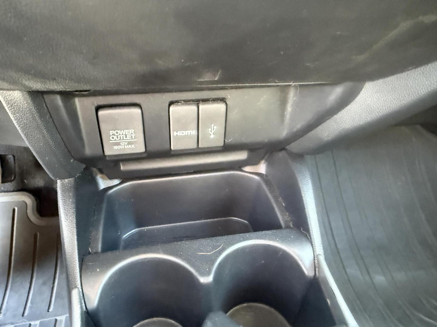 2016 Blue /Black Honda Fit EX-L CVT (3HGGK5H88GM) with an 1.5L I4 SOHC 16V engine, Automatic transmission, located at 11115 Chardon Rd. , Chardon, OH, 44024, (440) 214-9705, 41.580246, -81.241943 - This 2016 Honda Fit EX-L, powered by a 1.5L I4 engine, delivers impressive efficiency with up to 40 MPG highway and packs a surprising array of premium features for its class, including leather interior, heated front seats, a power moonroof, and a 7-inch touchscreen with push-button start. Safety an - Photo#26