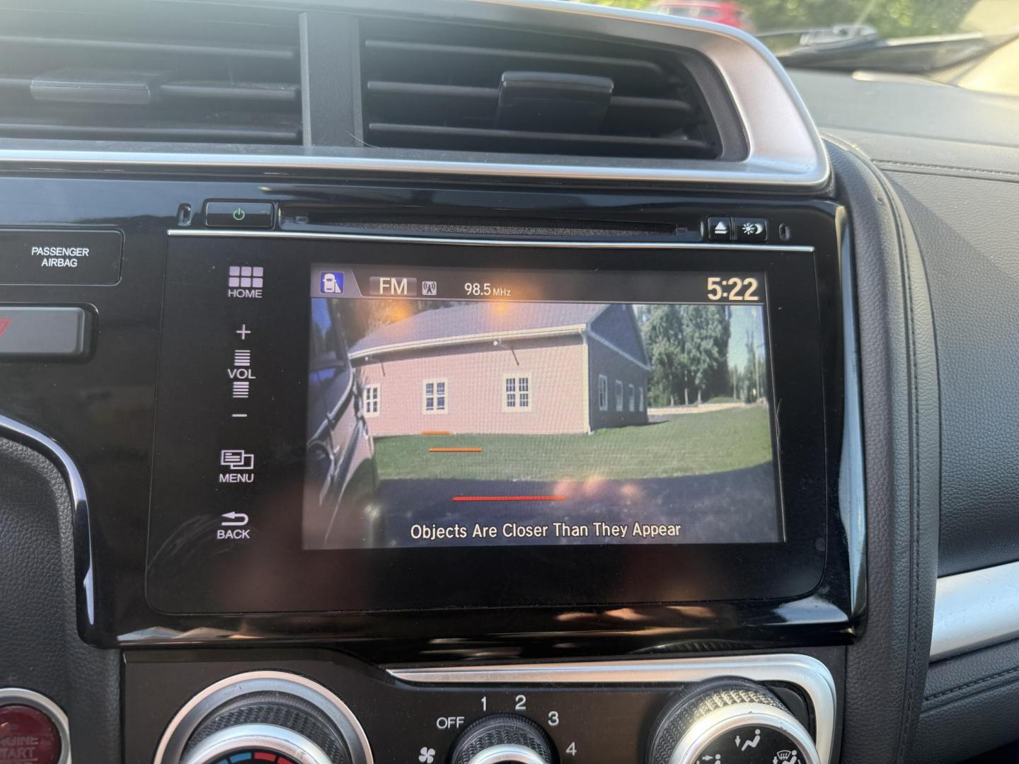 2016 Blue /Black Honda Fit EX-L CVT (3HGGK5H88GM) with an 1.5L I4 SOHC 16V engine, Automatic transmission, located at 11115 Chardon Rd. , Chardon, OH, 44024, (440) 214-9705, 41.580246, -81.241943 - This 2016 Honda Fit EX-L, powered by a 1.5L I4 engine, delivers impressive efficiency with up to 40 MPG highway and packs a surprising array of premium features for its class, including leather interior, heated front seats, a power moonroof, and a 7-inch touchscreen with push-button start. Safety an - Photo#25
