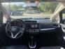 2016 Blue /Black Honda Fit EX-L CVT (3HGGK5H88GM) with an 1.5L I4 SOHC 16V engine, Automatic transmission, located at 11115 Chardon Rd. , Chardon, OH, 44024, (440) 214-9705, 41.580246, -81.241943 - This 2016 Honda Fit EX-L, powered by a 1.5L I4 engine, delivers impressive efficiency with up to 40 MPG highway and packs a surprising array of premium features for its class, including leather interior, heated front seats, a power moonroof, and a 7-inch touchscreen with push-button start. Safety an - Photo#34
