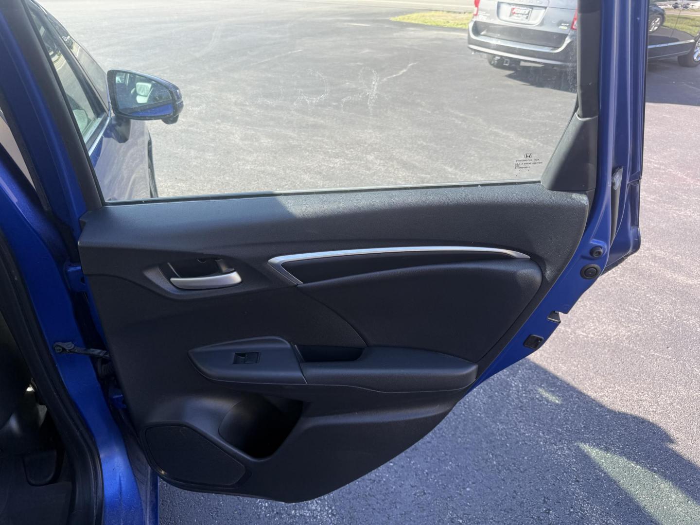 2016 Blue /Black Honda Fit EX-L CVT (3HGGK5H88GM) with an 1.5L I4 SOHC 16V engine, Automatic transmission, located at 11115 Chardon Rd. , Chardon, OH, 44024, (440) 214-9705, 41.580246, -81.241943 - This 2016 Honda Fit EX-L, powered by a 1.5L I4 engine, delivers impressive efficiency with up to 40 MPG highway and packs a surprising array of premium features for its class, including leather interior, heated front seats, a power moonroof, and a 7-inch touchscreen with push-button start. Safety an - Photo#38