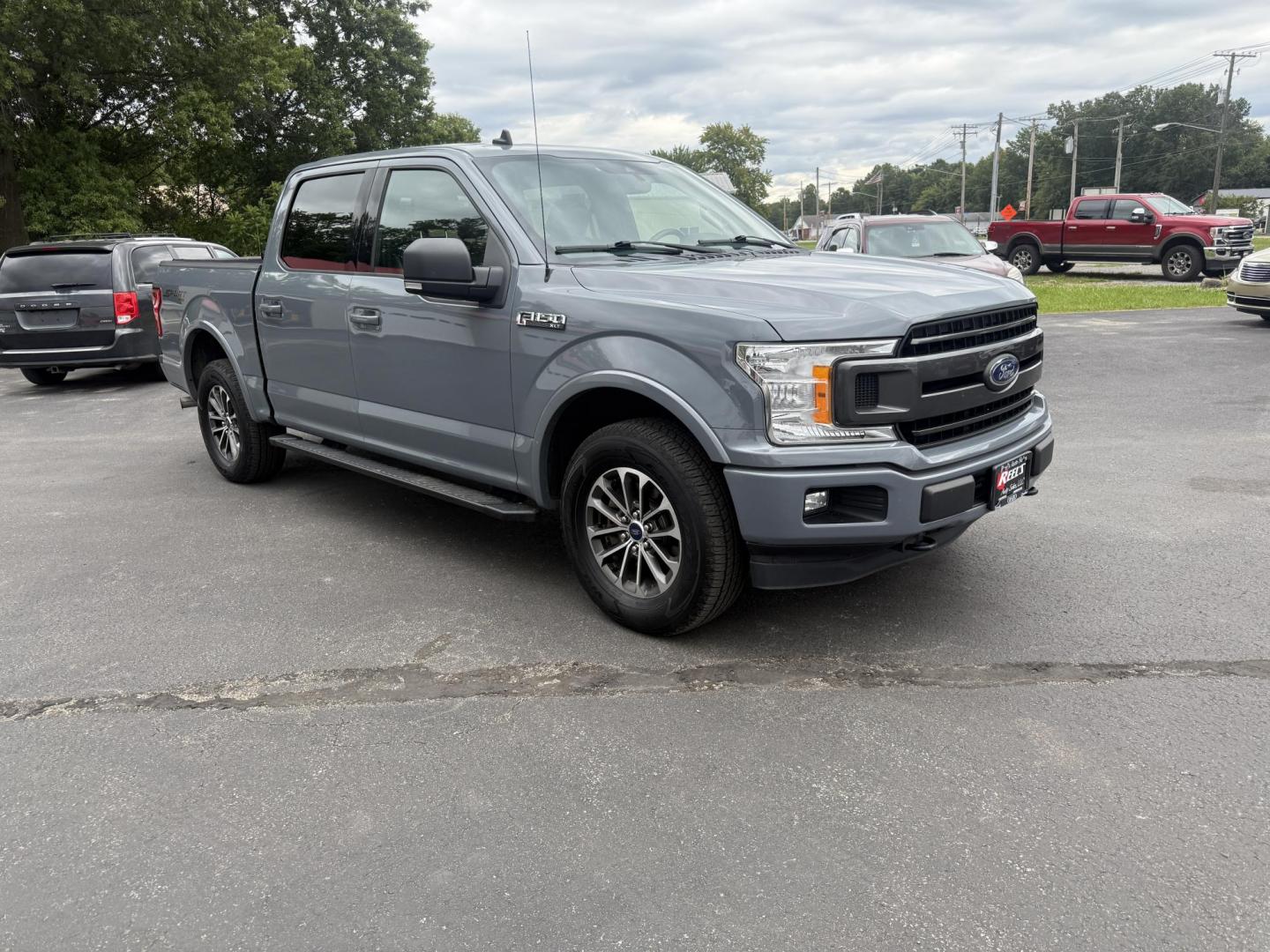 2019 Gray /Black Ford F-150 XLT SuperCrew 5.5-ft. Bed 4WD (1FTEW1EP8KF) with an 2.7L V6 DOHC 24V TWIN TURBO engine, 10 Speed Automatic Transmission transmission, located at 547 E. Main St., Orwell, OH, 44076, (440) 437-5893, 41.535435, -80.847855 - This 2019 Ford F-150 XLT Crew Cab with the 2.7L Twin Turbo EcoBoost V6 and 10-speed automatic transmission offers a strong blend of power and efficiency, delivering 24 MPG on the highway and a towing capacity of 7,600 lbs—ideal for both daily driving and moderate hauling needs. Equipped with 3.55 - Photo#2