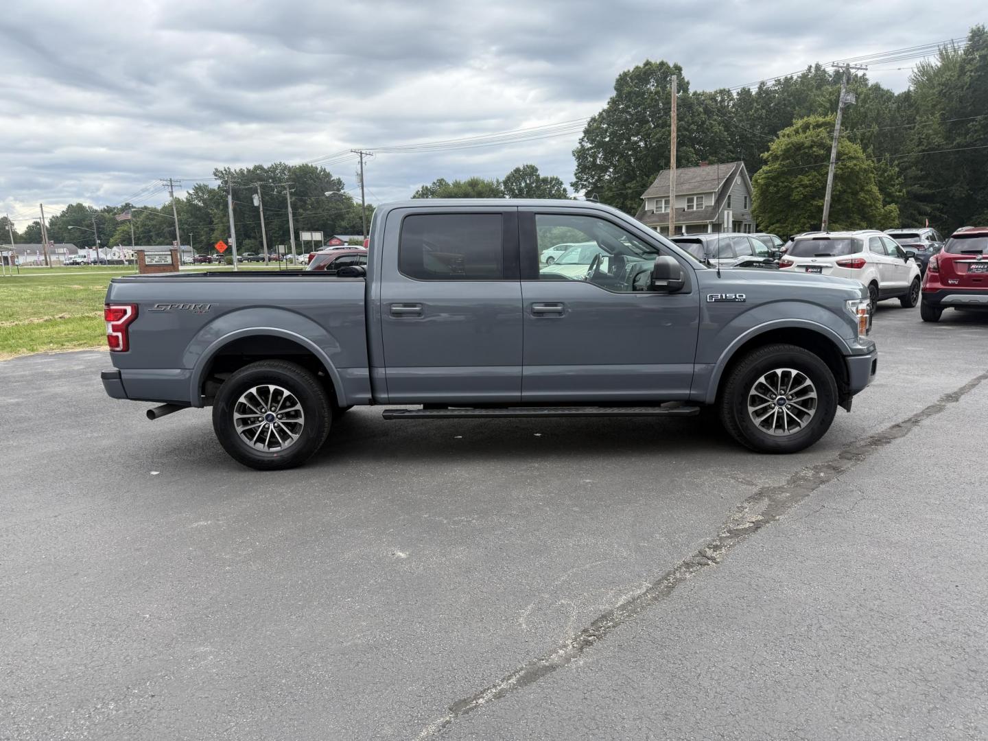 2019 Gray /Black Ford F-150 XLT SuperCrew 5.5-ft. Bed 4WD (1FTEW1EP8KF) with an 2.7L V6 DOHC 24V TWIN TURBO engine, 10 Speed Automatic Transmission transmission, located at 547 E. Main St., Orwell, OH, 44076, (440) 437-5893, 41.535435, -80.847855 - This 2019 Ford F-150 XLT Crew Cab with the 2.7L Twin Turbo EcoBoost V6 and 10-speed automatic transmission offers a strong blend of power and efficiency, delivering 24 MPG on the highway and a towing capacity of 7,600 lbs—ideal for both daily driving and moderate hauling needs. Equipped with 3.55 - Photo#5