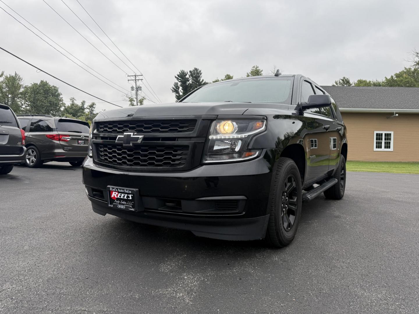2019 Black /Black Chevrolet Tahoe LS 4WD (1GNSKAKC1KR) with an 5.3L V8 OHV 16V engine, 6A transmission, located at 11115 Chardon Rd. , Chardon, OH, 44024, (440) 214-9705, 41.580246, -81.241943 - This 2019 Chevrolet Tahoe LS 4WD features a robust 5.3L EcoTec3 V8 engine paired with a 6-speed automatic transmission and 3.08 gearing, offering solid performance and a 6,200-pound towing capacity—suitable for family trips and light towing tasks. It comes well-equipped with power front seats, tri - Photo#0