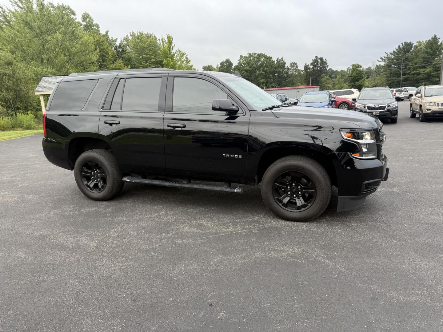 2019 Black /Black Chevrolet Tahoe LS 4WD (1GNSKAKC1KR) with an 5.3L V8 OHV 16V engine, 6A transmission, located at 11115 Chardon Rd. , Chardon, OH, 44024, (440) 214-9705, 41.580246, -81.241943 - This 2019 Chevrolet Tahoe LS 4WD features a robust 5.3L EcoTec3 V8 engine paired with a 6-speed automatic transmission and 3.08 gearing, offering solid performance and a 6,200-pound towing capacity—suitable for family trips and light towing tasks. It comes well-equipped with power front seats, tri - Photo#3