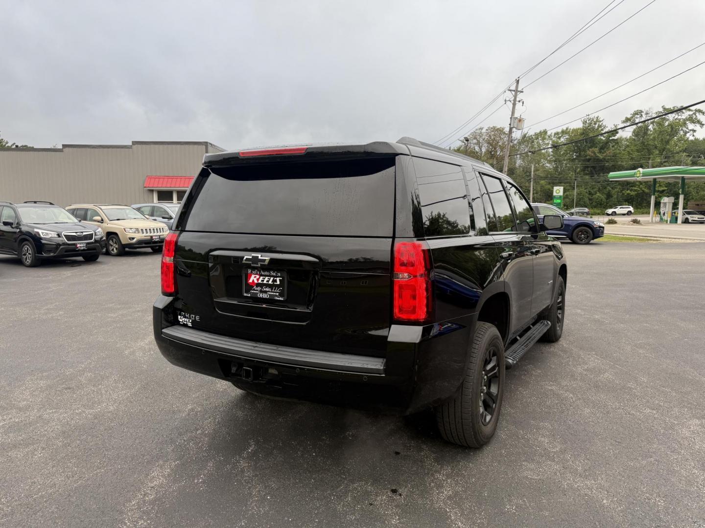 2019 Black /Black Chevrolet Tahoe LS 4WD (1GNSKAKC1KR) with an 5.3L V8 OHV 16V engine, 6A transmission, located at 11115 Chardon Rd. , Chardon, OH, 44024, (440) 214-9705, 41.580246, -81.241943 - This 2019 Chevrolet Tahoe LS 4WD features a robust 5.3L EcoTec3 V8 engine paired with a 6-speed automatic transmission and 3.08 gearing, offering solid performance and a 6,200-pound towing capacity—suitable for family trips and light towing tasks. It comes well-equipped with power front seats, tri - Photo#7