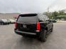 2019 Black /Black Chevrolet Tahoe LS 4WD (1GNSKAKC1KR) with an 5.3L V8 OHV 16V engine, 6A transmission, located at 11115 Chardon Rd. , Chardon, OH, 44024, (440) 214-9705, 41.580246, -81.241943 - This 2019 Chevrolet Tahoe LS 4WD features a robust 5.3L EcoTec3 V8 engine paired with a 6-speed automatic transmission and 3.08 gearing, offering solid performance and a 6,200-pound towing capacity—suitable for family trips and light towing tasks. It comes well-equipped with power front seats, tri - Photo#7