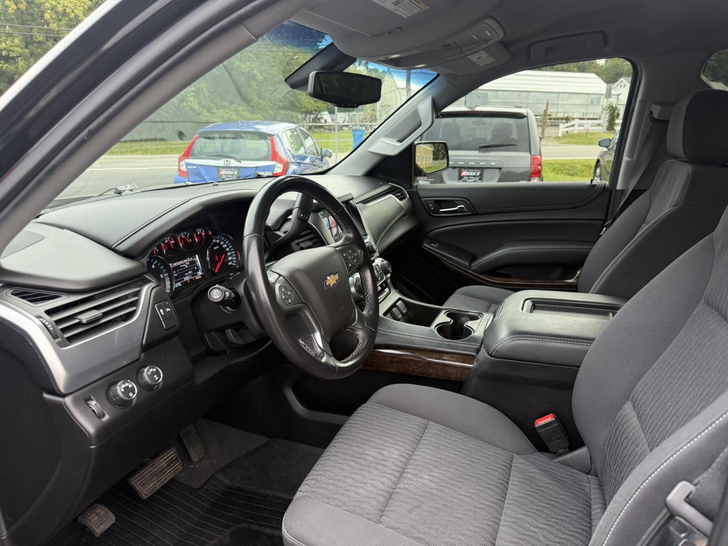2019 Black /Black Chevrolet Tahoe LS 4WD (1GNSKAKC1KR) with an 5.3L V8 OHV 16V engine, 6A transmission, located at 11115 Chardon Rd. , Chardon, OH, 44024, (440) 214-9705, 41.580246, -81.241943 - This 2019 Chevrolet Tahoe LS 4WD features a robust 5.3L EcoTec3 V8 engine paired with a 6-speed automatic transmission and 3.08 gearing, offering solid performance and a 6,200-pound towing capacity—suitable for family trips and light towing tasks. It comes well-equipped with power front seats, tri - Photo#14