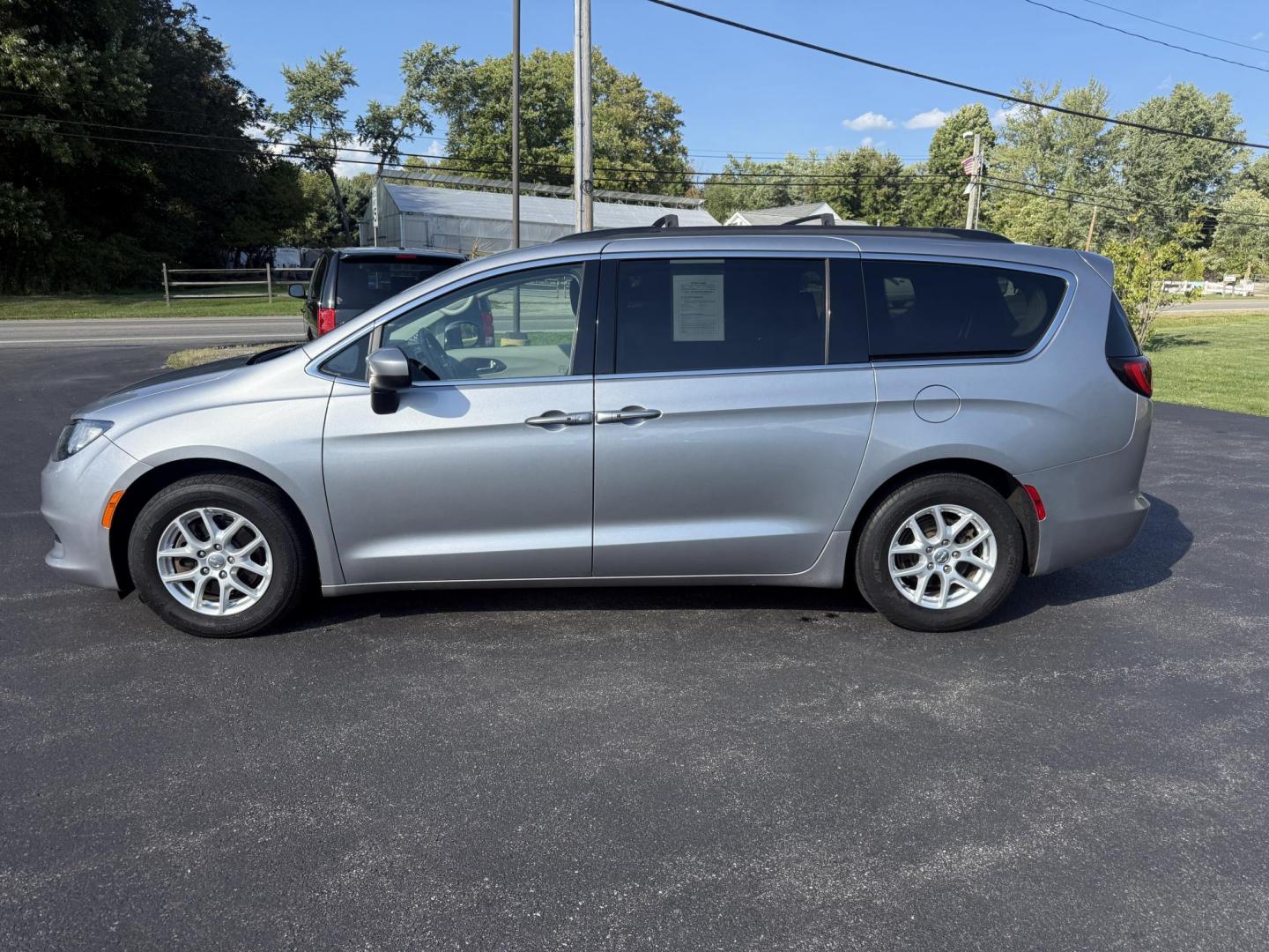 2020 Silver /Black Chrysler Voyager LXI (2C4RC1DG6LR) with an 3.6L V6 DOHC 24V engine, 9A transmission, located at 11115 Chardon Rd. , Chardon, OH, 44024, (440) 214-9705, 41.580246, -81.241943 - This 2020 Chrysler Voyager LXi is a practical minivan powered by a 3.6L Pentastar V6 engine paired with a 9-speed automatic transmission, delivering up to 28 MPG on the highway. It features conveniences like remote start, tri-zone manual climate control, a power liftgate, and advanced tech including - Photo#12