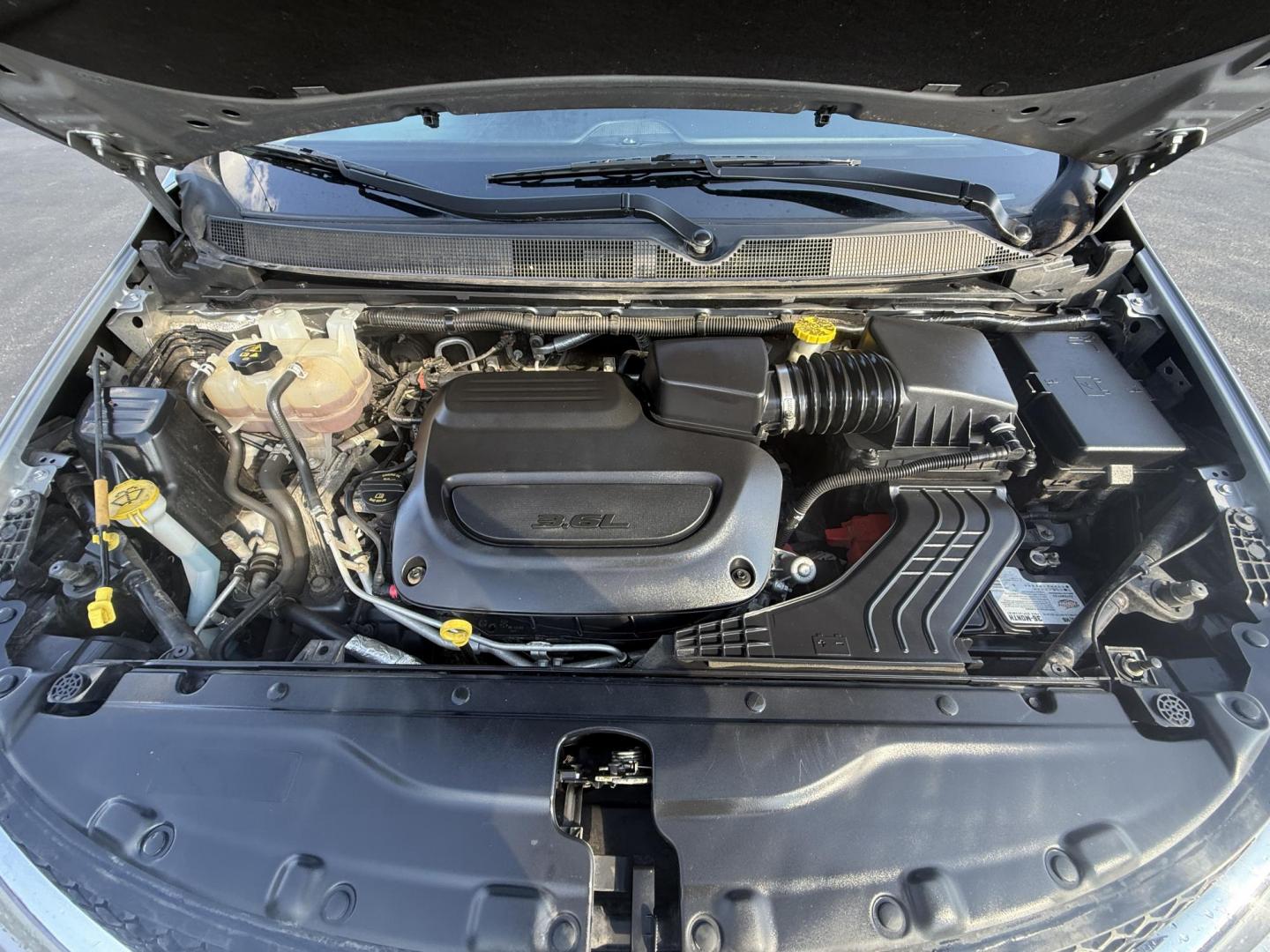 2020 Silver /Black Chrysler Voyager LXI (2C4RC1DG6LR) with an 3.6L V6 DOHC 24V engine, 9A transmission, located at 11115 Chardon Rd. , Chardon, OH, 44024, (440) 214-9705, 41.580246, -81.241943 - This 2020 Chrysler Voyager LXi is a practical minivan powered by a 3.6L Pentastar V6 engine paired with a 9-speed automatic transmission, delivering up to 28 MPG on the highway. It features conveniences like remote start, tri-zone manual climate control, a power liftgate, and advanced tech including - Photo#14