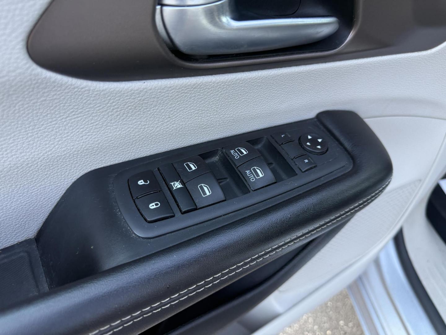 2020 Silver /Black Chrysler Voyager LXI (2C4RC1DG6LR) with an 3.6L V6 DOHC 24V engine, 9A transmission, located at 11115 Chardon Rd. , Chardon, OH, 44024, (440) 214-9705, 41.580246, -81.241943 - This 2020 Chrysler Voyager LXi is a practical minivan powered by a 3.6L Pentastar V6 engine paired with a 9-speed automatic transmission, delivering up to 28 MPG on the highway. It features conveniences like remote start, tri-zone manual climate control, a power liftgate, and advanced tech including - Photo#17