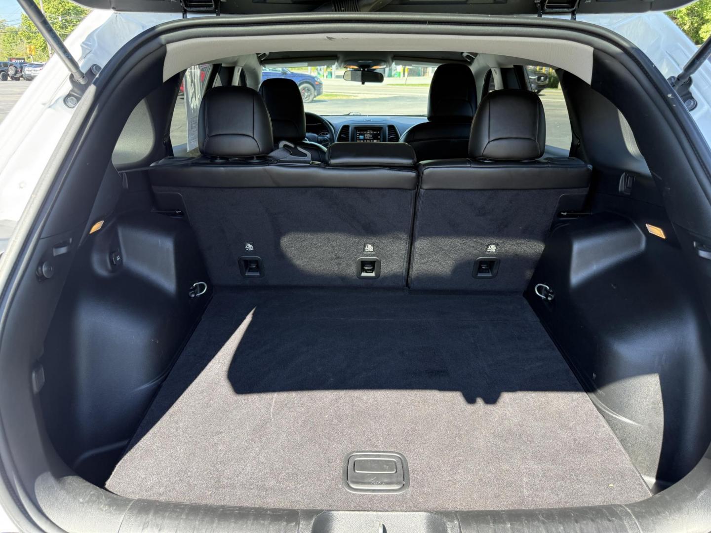 2019 White /Black Jeep Cherokee Latitude Plus 4WD (1C4PJMLB9KD) with an 2.4L I4 DOHC 16V engine, 9A transmission, located at 11115 Chardon Rd. , Chardon, OH, 44024, (440) 214-9705, 41.580246, -81.241943 - This 2019 Jeep Cherokee Latitude Plus 4X4 is equipped with a 2.4L I4 MultiAir engine and a 9-speed automatic transmission, delivering up to 29 MPG on the highway. Key features include a power driver’s seat, full LED exterior lighting, a 7.0" touchscreen with Apple CarPlay and Android Auto, a 3.5" - Photo#36