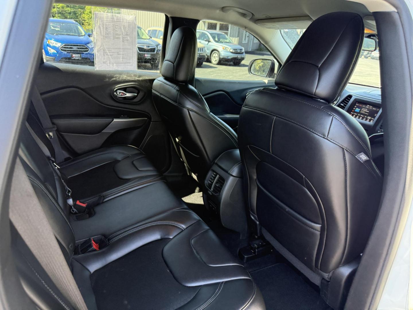 2019 White /Black Jeep Cherokee Latitude Plus 4WD (1C4PJMLB9KD) with an 2.4L I4 DOHC 16V engine, 9A transmission, located at 11115 Chardon Rd. , Chardon, OH, 44024, (440) 214-9705, 41.580246, -81.241943 - This 2019 Jeep Cherokee Latitude Plus 4X4 is equipped with a 2.4L I4 MultiAir engine and a 9-speed automatic transmission, delivering up to 29 MPG on the highway. Key features include a power driver’s seat, full LED exterior lighting, a 7.0" touchscreen with Apple CarPlay and Android Auto, a 3.5" - Photo#38