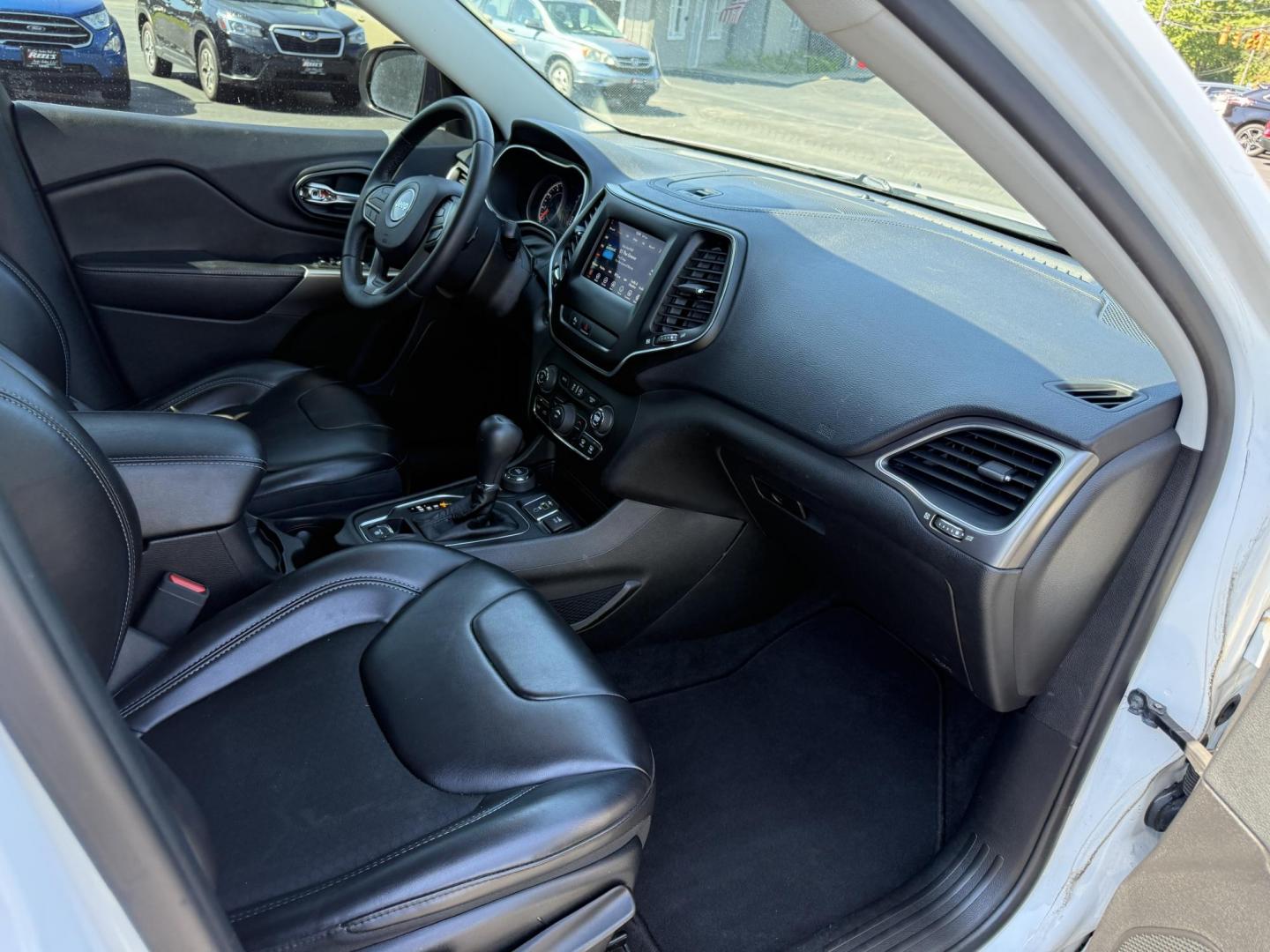 2019 White /Black Jeep Cherokee Latitude Plus 4WD (1C4PJMLB9KD) with an 2.4L I4 DOHC 16V engine, 9A transmission, located at 11115 Chardon Rd. , Chardon, OH, 44024, (440) 214-9705, 41.580246, -81.241943 - This 2019 Jeep Cherokee Latitude Plus 4X4 is equipped with a 2.4L I4 MultiAir engine and a 9-speed automatic transmission, delivering up to 29 MPG on the highway. Key features include a power driver’s seat, full LED exterior lighting, a 7.0" touchscreen with Apple CarPlay and Android Auto, a 3.5" - Photo#40