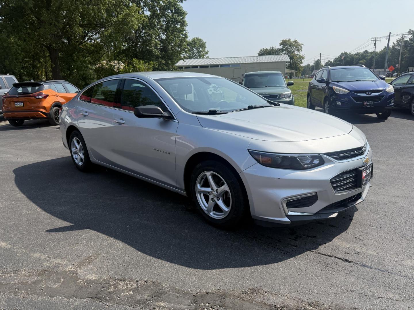 2018 Silver /Black Chevrolet Malibu LS (1G1ZB5ST0JF) with an 1.5L I4 DOHC 16V Turbo engine, 6A transmission, located at 11115 Chardon Rd. , Chardon, OH, 44024, (440) 214-9705, 41.580246, -81.241943 - This 2018 Chevrolet Malibu LS is a fuel-efficient midsize sedan powered by a 1.5L turbocharged EcoTec I4 engine and 6-speed automatic transmission, achieving up to 36 MPG on the highway. It features a 7.0" touchscreen with Apple CarPlay and Android Auto, a 4.2" gauge cluster screen, backup camera, a - Photo#2