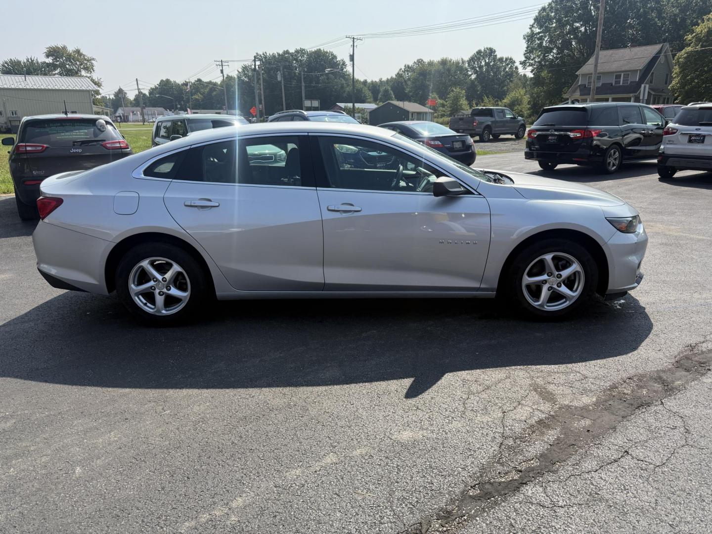 2018 Silver /Black Chevrolet Malibu LS (1G1ZB5ST0JF) with an 1.5L I4 DOHC 16V Turbo engine, 6A transmission, located at 11115 Chardon Rd. , Chardon, OH, 44024, (440) 214-9705, 41.580246, -81.241943 - This 2018 Chevrolet Malibu LS is a fuel-efficient midsize sedan powered by a 1.5L turbocharged EcoTec I4 engine and 6-speed automatic transmission, achieving up to 36 MPG on the highway. It features a 7.0" touchscreen with Apple CarPlay and Android Auto, a 4.2" gauge cluster screen, backup camera, a - Photo#5