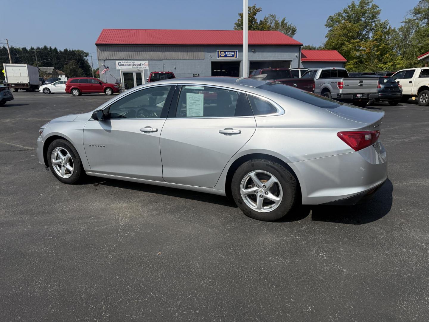 2018 Silver /Black Chevrolet Malibu LS (1G1ZB5ST0JF) with an 1.5L I4 DOHC 16V Turbo engine, 6A transmission, located at 11115 Chardon Rd. , Chardon, OH, 44024, (440) 214-9705, 41.580246, -81.241943 - This 2018 Chevrolet Malibu LS is a fuel-efficient midsize sedan powered by a 1.5L turbocharged EcoTec I4 engine and 6-speed automatic transmission, achieving up to 36 MPG on the highway. It features a 7.0" touchscreen with Apple CarPlay and Android Auto, a 4.2" gauge cluster screen, backup camera, a - Photo#10