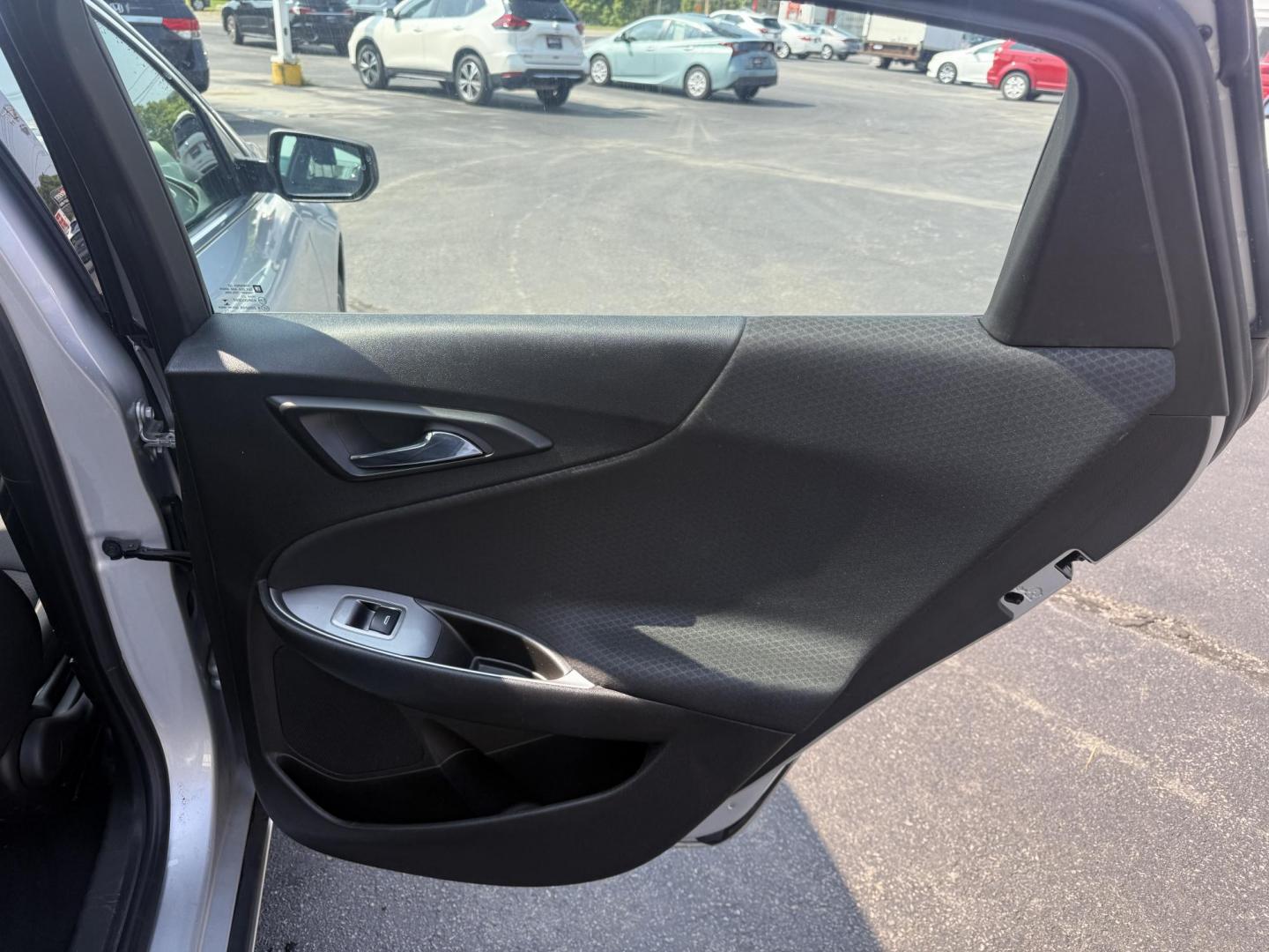 2018 Silver /Black Chevrolet Malibu LS (1G1ZB5ST0JF) with an 1.5L I4 DOHC 16V Turbo engine, 6A transmission, located at 11115 Chardon Rd. , Chardon, OH, 44024, (440) 214-9705, 41.580246, -81.241943 - This 2018 Chevrolet Malibu LS is a fuel-efficient midsize sedan powered by a 1.5L turbocharged EcoTec I4 engine and 6-speed automatic transmission, achieving up to 36 MPG on the highway. It features a 7.0" touchscreen with Apple CarPlay and Android Auto, a 4.2" gauge cluster screen, backup camera, a - Photo#33