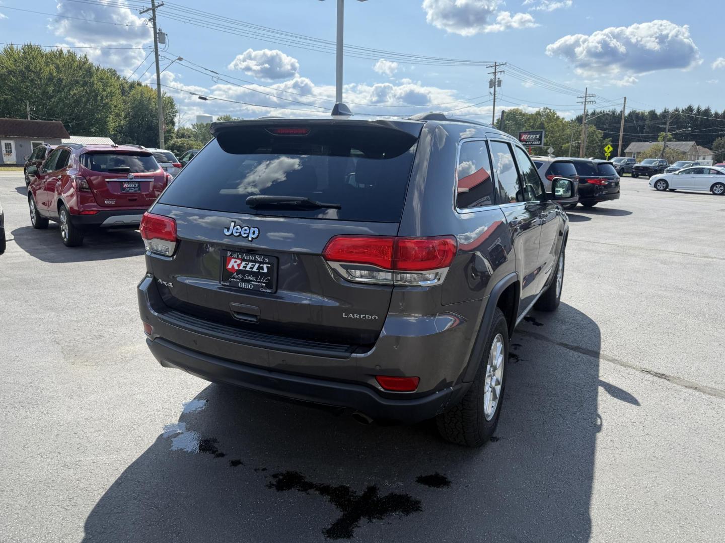 2019 Gray /Black Jeep Grand Cherokee Laredo E 4WD (1C4RJFAG7KC) with an 3.6L V6 DOHC 24V engine, 8A transmission, located at 547 E. Main St., Orwell, OH, 44076, (440) 437-5893, 41.535435, -80.847855 - This 2019 Jeep Grand Cherokee Laredo E 4WD features a 3.6L Pentastar V6 engine with an 8-speed automatic transmission and the Quadra-Trac 1 4WD system, delivering 25 MPG on the highway. Comfort and convenience are provided by a power driver’s seat, dual-zone automatic climate control, a 7.0" touch - Photo#7