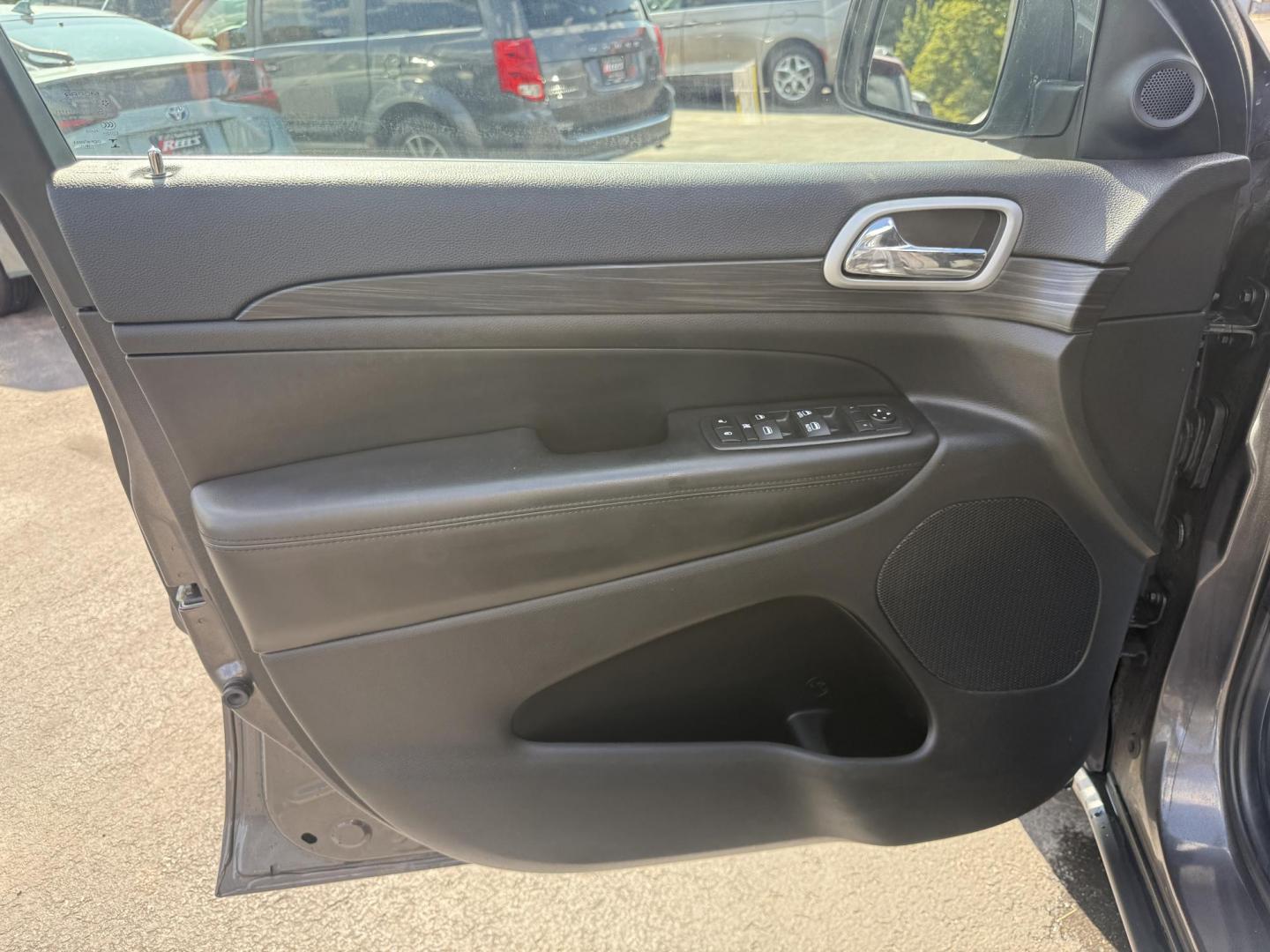 2019 Gray /Black Jeep Grand Cherokee Laredo E 4WD (1C4RJFAG7KC) with an 3.6L V6 DOHC 24V engine, 8A transmission, located at 547 E. Main St., Orwell, OH, 44076, (440) 437-5893, 41.535435, -80.847855 - This 2019 Jeep Grand Cherokee Laredo E 4WD features a 3.6L Pentastar V6 engine with an 8-speed automatic transmission and the Quadra-Trac 1 4WD system, delivering 25 MPG on the highway. Comfort and convenience are provided by a power driver’s seat, dual-zone automatic climate control, a 7.0" touch - Photo#16