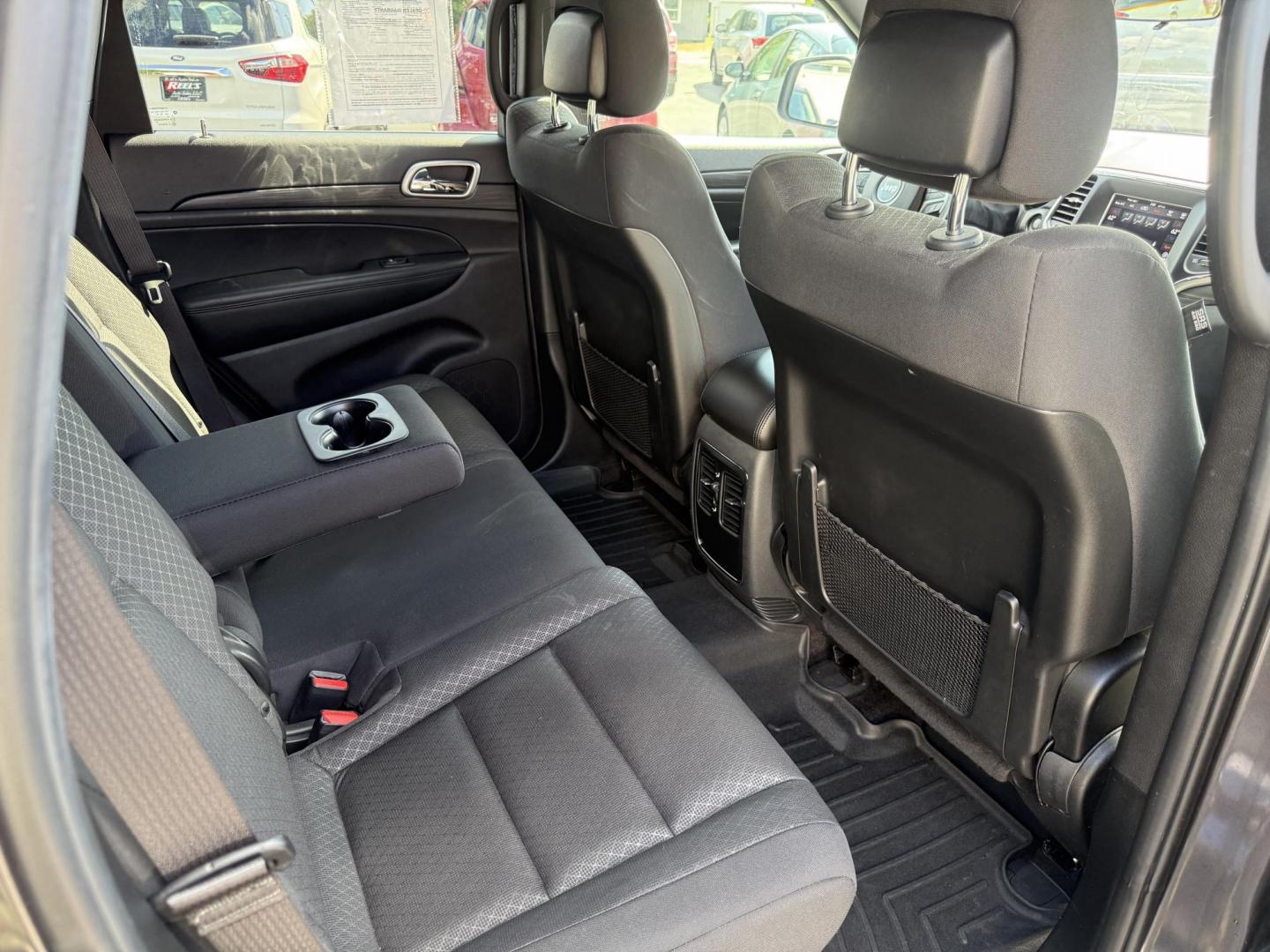 2019 Gray /Black Jeep Grand Cherokee Laredo E 4WD (1C4RJFAG7KC) with an 3.6L V6 DOHC 24V engine, 8A transmission, located at 547 E. Main St., Orwell, OH, 44076, (440) 437-5893, 41.535435, -80.847855 - This 2019 Jeep Grand Cherokee Laredo E 4WD features a 3.6L Pentastar V6 engine with an 8-speed automatic transmission and the Quadra-Trac 1 4WD system, delivering 25 MPG on the highway. Comfort and convenience are provided by a power driver’s seat, dual-zone automatic climate control, a 7.0" touch - Photo#37