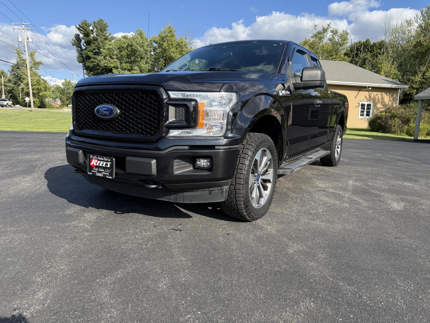 2019 Black /Black Ford F-150 STX SuperCab 6.5-ft. 4WD (1FTEX1EP2KK) with an 2.7L V6 DOHC 24V TWIN TURBO engine, 10 Speed Auto transmission, located at 11115 Chardon Rd. , Chardon, OH, 44024, (440) 214-9705, 41.580246, -81.241943 - This 2019 Ford F-150 STX SuperCab 4WD is a capable and efficient pickup, powered by a 2.7L twin-turbo EcoBoost V6 engine with 325 hp and 400 lb-ft of torque, paired to a 10-speed automatic transmission and 3.55 gearing, achieving 24 MPG highway and offering a 7,600-pound towing capacity. It features - Photo#0