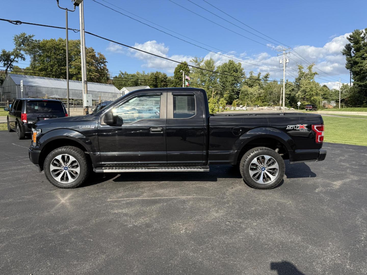 2019 Black /Black Ford F-150 STX SuperCab 6.5-ft. 4WD (1FTEX1EP2KK) with an 2.7L V6 DOHC 24V TWIN TURBO engine, 10 Speed Auto transmission, located at 11115 Chardon Rd. , Chardon, OH, 44024, (440) 214-9705, 41.580246, -81.241943 - This 2019 Ford F-150 STX SuperCab 4WD is a capable and efficient pickup, powered by a 2.7L twin-turbo EcoBoost V6 engine with 325 hp and 400 lb-ft of torque, paired to a 10-speed automatic transmission and 3.55 gearing, achieving 24 MPG highway and offering a 7,600-pound towing capacity. It features - Photo#14