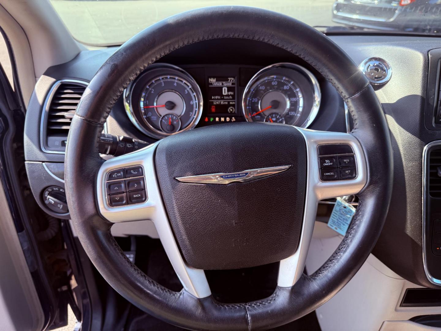 2015 Blue /Black Chrysler Town & Country Touring (2C4RC1BG0FR) with an 3.6L V6 DOHC 24V engine, 6-Speed Automatic transmission, located at 11115 Chardon Rd. , Chardon, OH, 44024, (440) 214-9705, 41.580246, -81.241943 - This 2015 Chrysler Town & Country Touring features a 3.6L Pentastar V6 engine paired with a 6-speed automatic transmission, and comes equipped with premium amenities including leather interior, tri-zone automatic climate control, Stow 'n Go seating for versatile cargo and passenger arrangements, a b - Photo#24