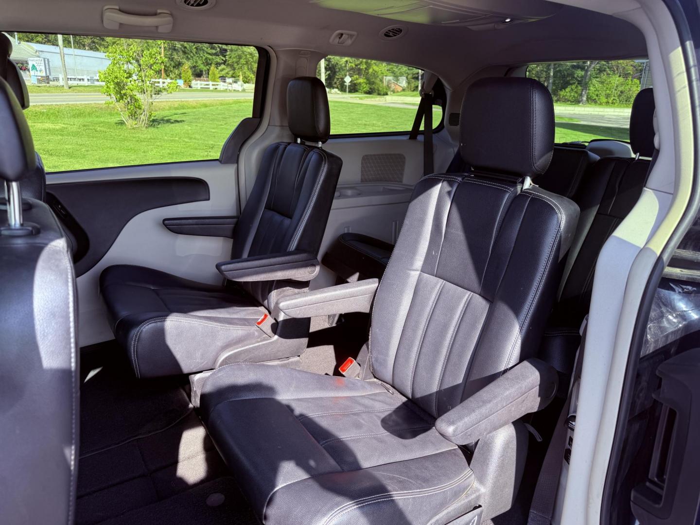 2015 Blue /Black Chrysler Town & Country Touring (2C4RC1BG0FR) with an 3.6L V6 DOHC 24V engine, 6-Speed Automatic transmission, located at 11115 Chardon Rd. , Chardon, OH, 44024, (440) 214-9705, 41.580246, -81.241943 - This 2015 Chrysler Town & Country Touring features a 3.6L Pentastar V6 engine paired with a 6-speed automatic transmission, and comes equipped with premium amenities including leather interior, tri-zone automatic climate control, Stow 'n Go seating for versatile cargo and passenger arrangements, a b - Photo#33