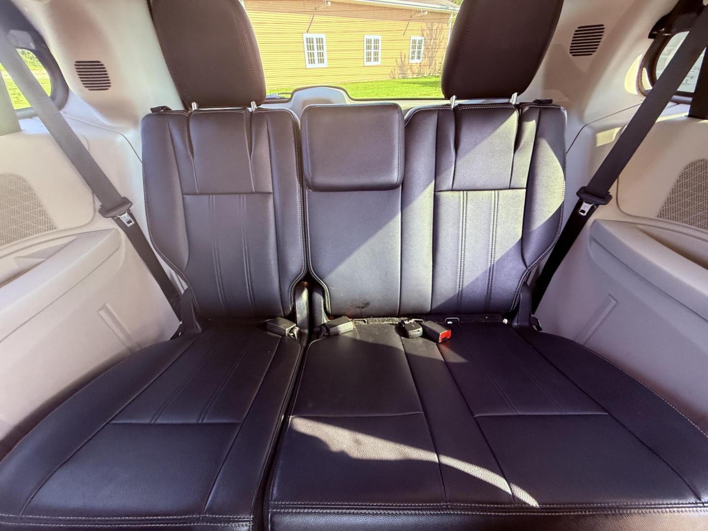 2015 Blue /Black Chrysler Town & Country Touring (2C4RC1BG0FR) with an 3.6L V6 DOHC 24V engine, 6-Speed Automatic transmission, located at 11115 Chardon Rd. , Chardon, OH, 44024, (440) 214-9705, 41.580246, -81.241943 - This 2015 Chrysler Town & Country Touring features a 3.6L Pentastar V6 engine paired with a 6-speed automatic transmission, and comes equipped with premium amenities including leather interior, tri-zone automatic climate control, Stow 'n Go seating for versatile cargo and passenger arrangements, a b - Photo#37