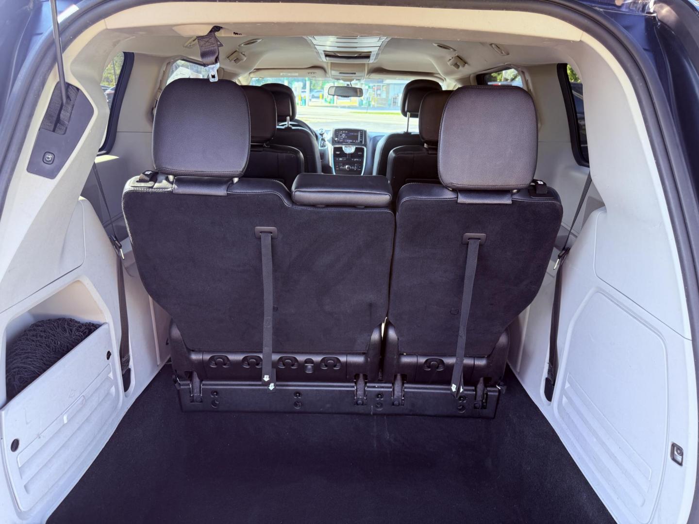 2015 Blue /Black Chrysler Town & Country Touring (2C4RC1BG0FR) with an 3.6L V6 DOHC 24V engine, 6-Speed Automatic transmission, located at 11115 Chardon Rd. , Chardon, OH, 44024, (440) 214-9705, 41.580246, -81.241943 - This 2015 Chrysler Town & Country Touring features a 3.6L Pentastar V6 engine paired with a 6-speed automatic transmission, and comes equipped with premium amenities including leather interior, tri-zone automatic climate control, Stow 'n Go seating for versatile cargo and passenger arrangements, a b - Photo#38