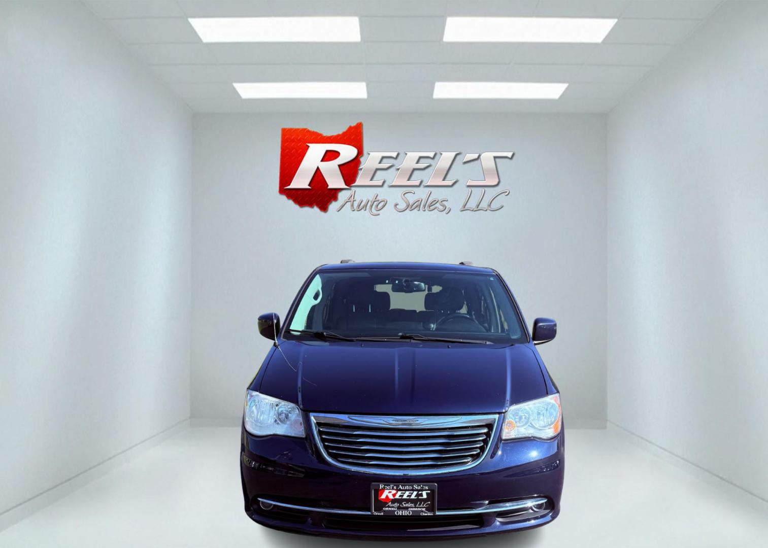 2015 Blue /Black Chrysler Town & Country Touring (2C4RC1BG0FR) with an 3.6L V6 DOHC 24V engine, 6-Speed Automatic transmission, located at 11115 Chardon Rd. , Chardon, OH, 44024, (440) 214-9705, 41.580246, -81.241943 - This 2015 Chrysler Town & Country Touring features a 3.6L Pentastar V6 engine paired with a 6-speed automatic transmission, and comes equipped with premium amenities including leather interior, tri-zone automatic climate control, Stow 'n Go seating for versatile cargo and passenger arrangements, a b - Photo#1