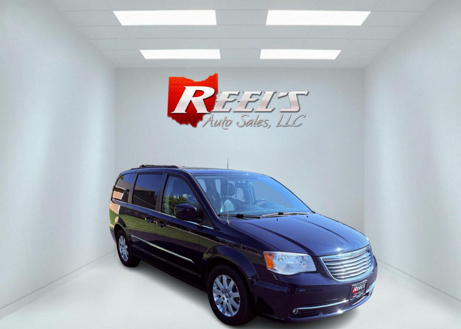 2015 Blue /Black Chrysler Town & Country Touring (2C4RC1BG0FR) with an 3.6L V6 DOHC 24V engine, 6-Speed Automatic transmission, located at 11115 Chardon Rd. , Chardon, OH, 44024, (440) 214-9705, 41.580246, -81.241943 - This 2015 Chrysler Town & Country Touring features a 3.6L Pentastar V6 engine paired with a 6-speed automatic transmission, and comes equipped with premium amenities including leather interior, tri-zone automatic climate control, Stow 'n Go seating for versatile cargo and passenger arrangements, a b - Photo#2