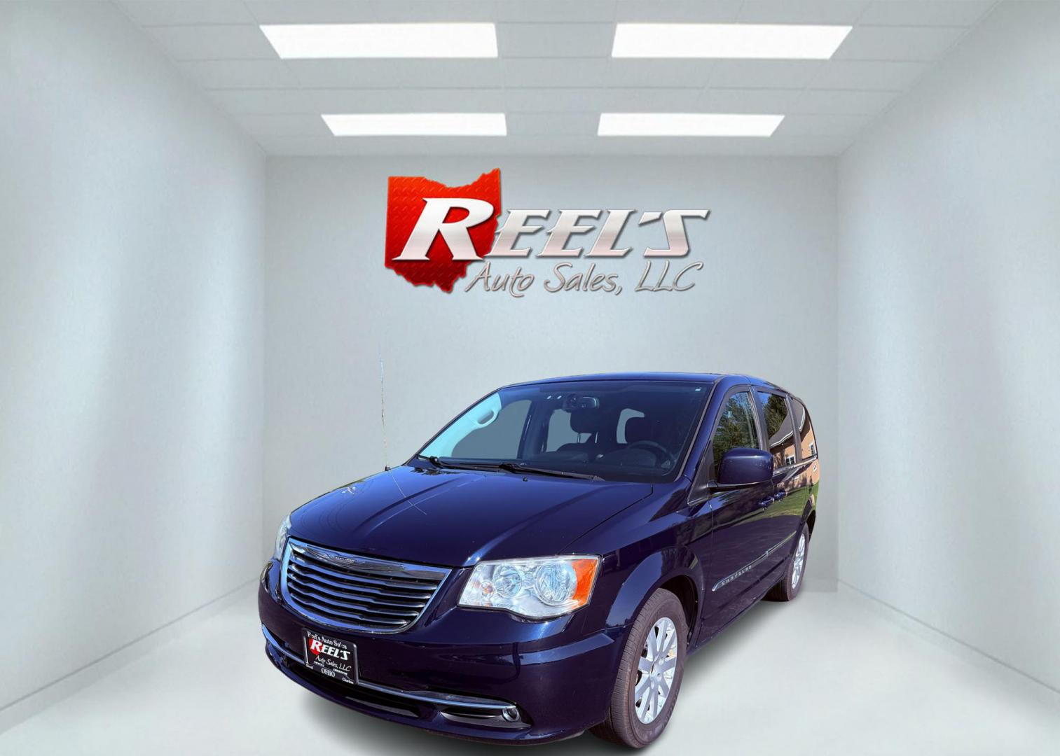 2015 Blue /Black Chrysler Town & Country Touring (2C4RC1BG0FR) with an 3.6L V6 DOHC 24V engine, 6-Speed Automatic transmission, located at 11115 Chardon Rd. , Chardon, OH, 44024, (440) 214-9705, 41.580246, -81.241943 - This 2015 Chrysler Town & Country Touring features a 3.6L Pentastar V6 engine paired with a 6-speed automatic transmission, and comes equipped with premium amenities including leather interior, tri-zone automatic climate control, Stow 'n Go seating for versatile cargo and passenger arrangements, a b - Photo#0