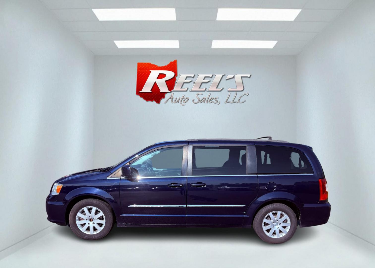 2015 Blue /Black Chrysler Town & Country Touring (2C4RC1BG0FR) with an 3.6L V6 DOHC 24V engine, 6-Speed Automatic transmission, located at 11115 Chardon Rd. , Chardon, OH, 44024, (440) 214-9705, 41.580246, -81.241943 - This 2015 Chrysler Town & Country Touring features a 3.6L Pentastar V6 engine paired with a 6-speed automatic transmission, and comes equipped with premium amenities including leather interior, tri-zone automatic climate control, Stow 'n Go seating for versatile cargo and passenger arrangements, a b - Photo#13