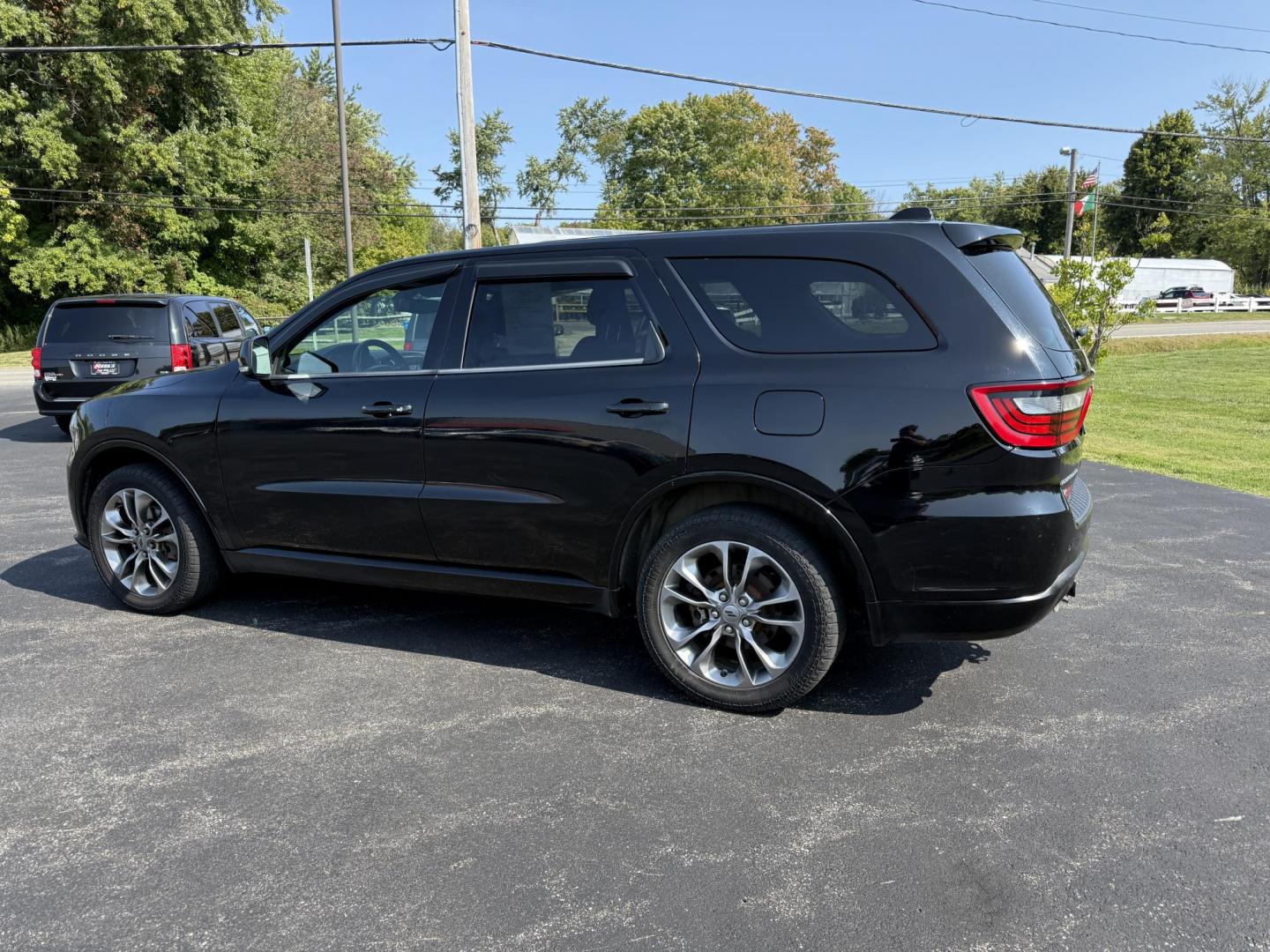 2019 Black /Black Dodge Durango GT Plus AWD (1C4RDJDGXKC) with an 3.6L V6 DOHC 24V engine, 8A transmission, located at 547 E. Main St., Orwell, OH, 44076, (440) 437-5893, 41.535435, -80.847855 - The 2019 Dodge Durango GT Plus AWD is a versatile SUV powered by a 3.6L Pentastar V6 engine paired with an 8-speed automatic transmission, offering 25 MPG on the highway and a 3,500-pound towing capacity. It features a leather interior with power front seats, heated front and second-row seats, tri-z - Photo#10