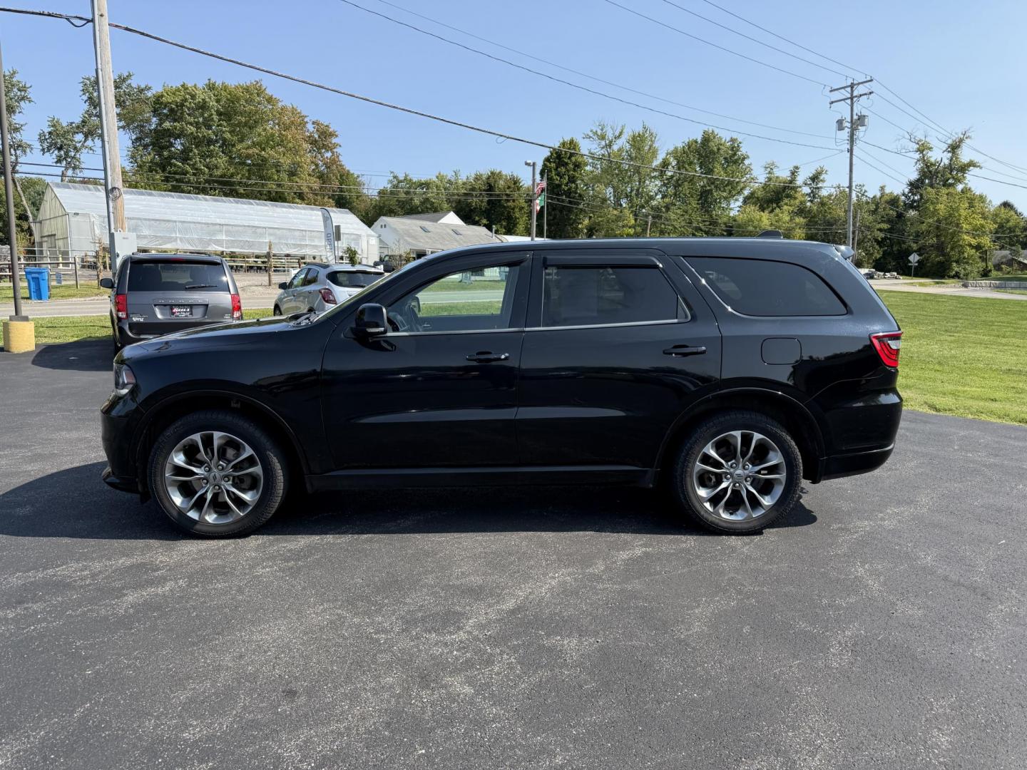 2019 Black /Black Dodge Durango GT Plus AWD (1C4RDJDGXKC) with an 3.6L V6 DOHC 24V engine, 8A transmission, located at 547 E. Main St., Orwell, OH, 44076, (440) 437-5893, 41.535435, -80.847855 - The 2019 Dodge Durango GT Plus AWD is a versatile SUV powered by a 3.6L Pentastar V6 engine paired with an 8-speed automatic transmission, offering 25 MPG on the highway and a 3,500-pound towing capacity. It features a leather interior with power front seats, heated front and second-row seats, tri-z - Photo#12
