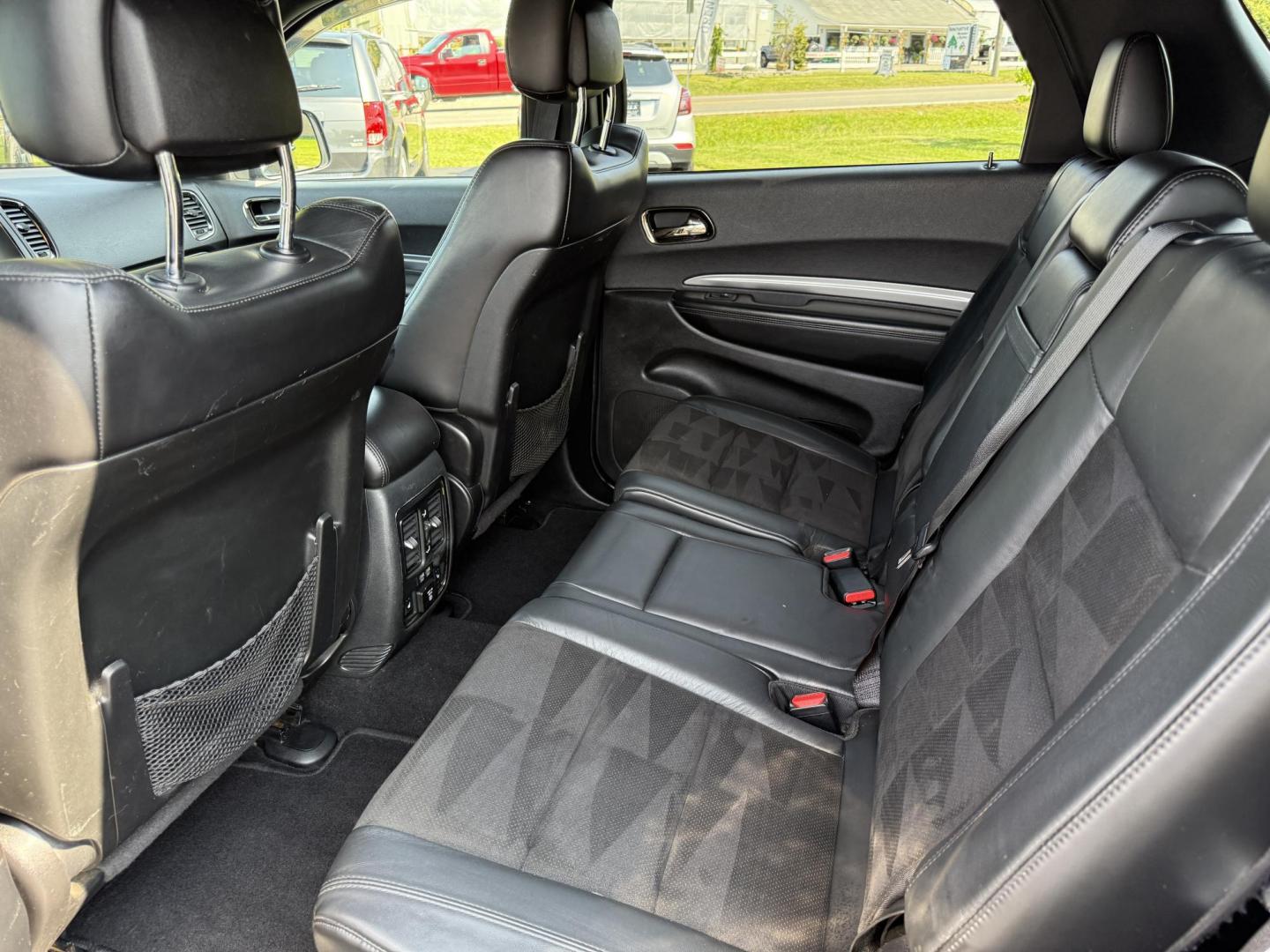 2019 Black /Black Dodge Durango GT Plus AWD (1C4RDJDGXKC) with an 3.6L V6 DOHC 24V engine, 8A transmission, located at 547 E. Main St., Orwell, OH, 44076, (440) 437-5893, 41.535435, -80.847855 - The 2019 Dodge Durango GT Plus AWD is a versatile SUV powered by a 3.6L Pentastar V6 engine paired with an 8-speed automatic transmission, offering 25 MPG on the highway and a 3,500-pound towing capacity. It features a leather interior with power front seats, heated front and second-row seats, tri-z - Photo#33
