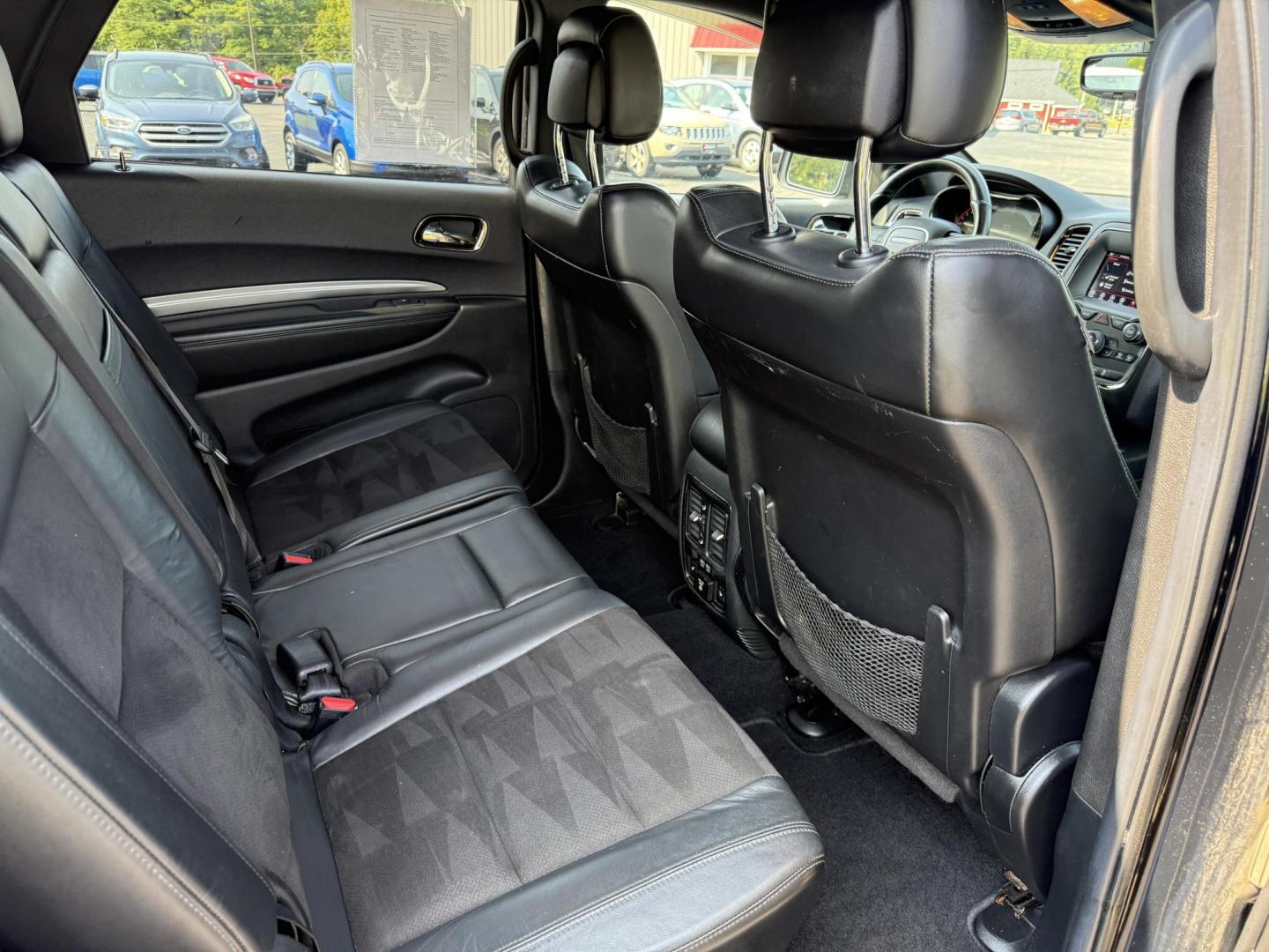 2019 Black /Black Dodge Durango GT Plus AWD (1C4RDJDGXKC) with an 3.6L V6 DOHC 24V engine, 8A transmission, located at 547 E. Main St., Orwell, OH, 44076, (440) 437-5893, 41.535435, -80.847855 - The 2019 Dodge Durango GT Plus AWD is a versatile SUV powered by a 3.6L Pentastar V6 engine paired with an 8-speed automatic transmission, offering 25 MPG on the highway and a 3,500-pound towing capacity. It features a leather interior with power front seats, heated front and second-row seats, tri-z - Photo#41