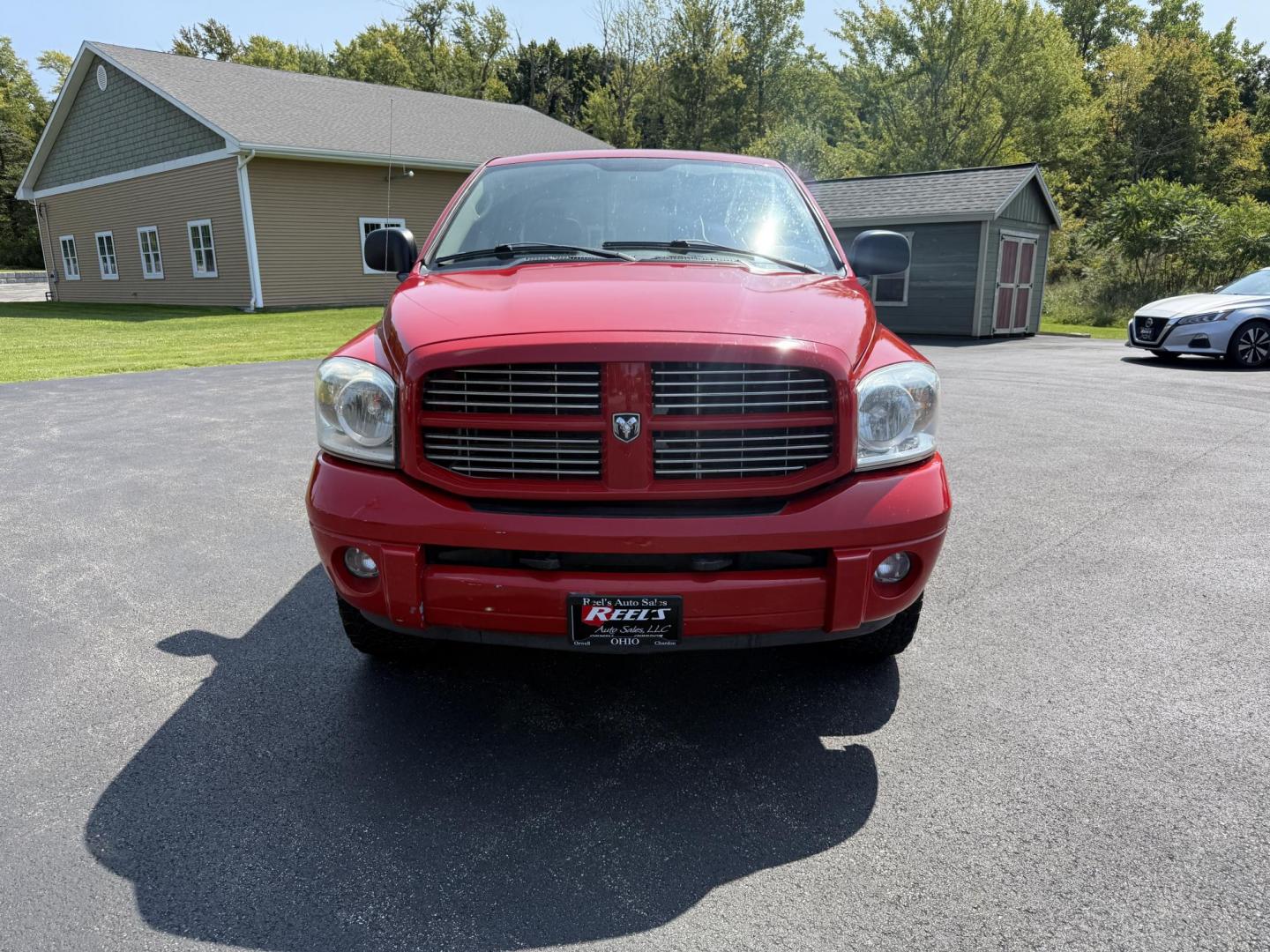 2008 Red /Gray Dodge Ram 1500 SLT Quad Cab 4WD (1D7HU18288S) with an 5.7L V8 OHV 16V engine, 5-Speed Automatic Overdrive transmission, located at 11115 Chardon Rd. , Chardon, OH, 44024, (440) 214-9705, 41.580246, -81.241943 - This 2008 Dodge Ram 1500 SLT Quad Cab has spent it's entire life down in Texas. Powered by the 5.7 HEMI V8 engine, 5 speed automatic transmission and 3.93 gearing this truck is rated to tow a respectable 7,450 pounds. On the inside you get a power drivers seat and an aftermarket radio with Bluetooth - Photo#1