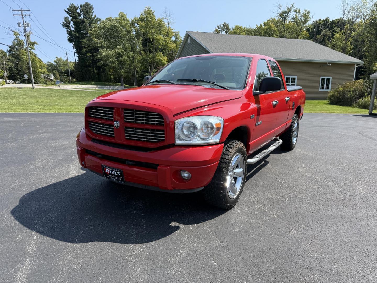 2008 Red /Gray Dodge Ram 1500 SLT Quad Cab 4WD (1D7HU18288S) with an 5.7L V8 OHV 16V engine, 5-Speed Automatic Overdrive transmission, located at 11115 Chardon Rd. , Chardon, OH, 44024, (440) 214-9705, 41.580246, -81.241943 - This 2008 Dodge Ram 1500 SLT Quad Cab has spent it's entire life down in Texas. Powered by the 5.7 HEMI V8 engine, 5 speed automatic transmission and 3.93 gearing this truck is rated to tow a respectable 7,450 pounds. On the inside you get a power drivers seat and an aftermarket radio with Bluetooth - Photo#0