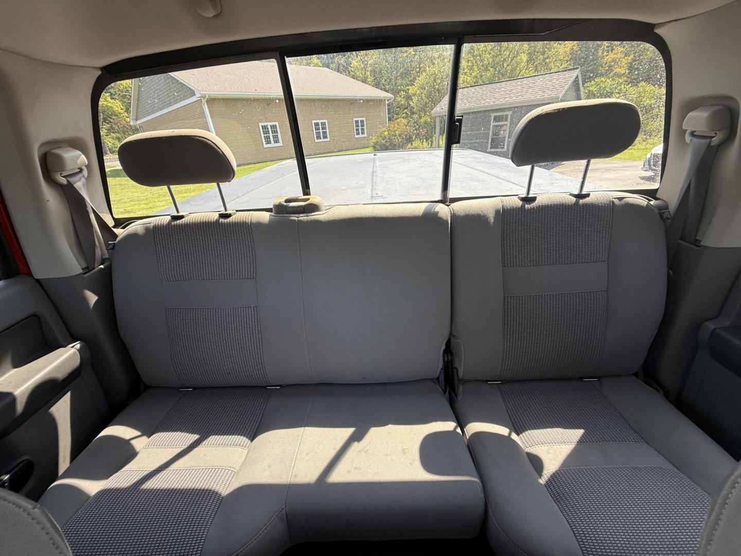 2008 Red /Gray Dodge Ram 1500 SLT Quad Cab 4WD (1D7HU18288S) with an 5.7L V8 OHV 16V engine, 5-Speed Automatic Overdrive transmission, located at 11115 Chardon Rd. , Chardon, OH, 44024, (440) 214-9705, 41.580246, -81.241943 - This 2008 Dodge Ram 1500 SLT Quad Cab has spent it's entire life down in Texas. Powered by the 5.7 HEMI V8 engine, 5 speed automatic transmission and 3.93 gearing this truck is rated to tow a respectable 7,450 pounds. On the inside you get a power drivers seat and an aftermarket radio with Bluetooth - Photo#30