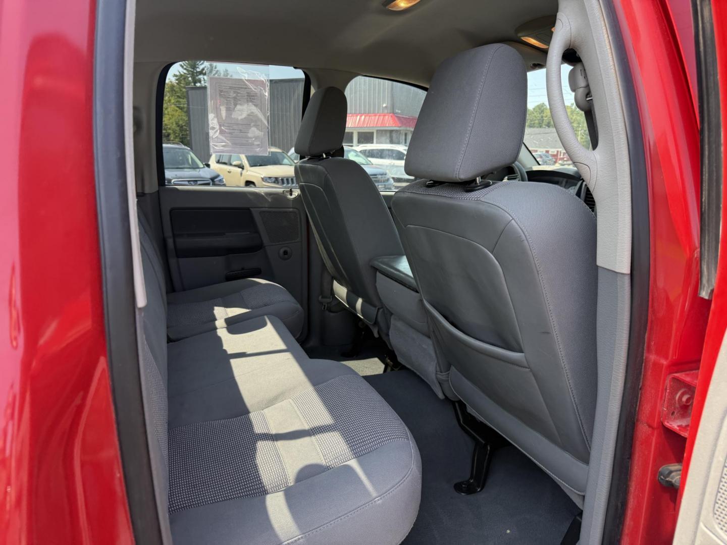 2008 Red /Gray Dodge Ram 1500 SLT Quad Cab 4WD (1D7HU18288S) with an 5.7L V8 OHV 16V engine, 5-Speed Automatic Overdrive transmission, located at 11115 Chardon Rd. , Chardon, OH, 44024, (440) 214-9705, 41.580246, -81.241943 - This 2008 Dodge Ram 1500 SLT Quad Cab has spent it's entire life down in Texas. Powered by the 5.7 HEMI V8 engine, 5 speed automatic transmission and 3.93 gearing this truck is rated to tow a respectable 7,450 pounds. On the inside you get a power drivers seat and an aftermarket radio with Bluetooth - Photo#34