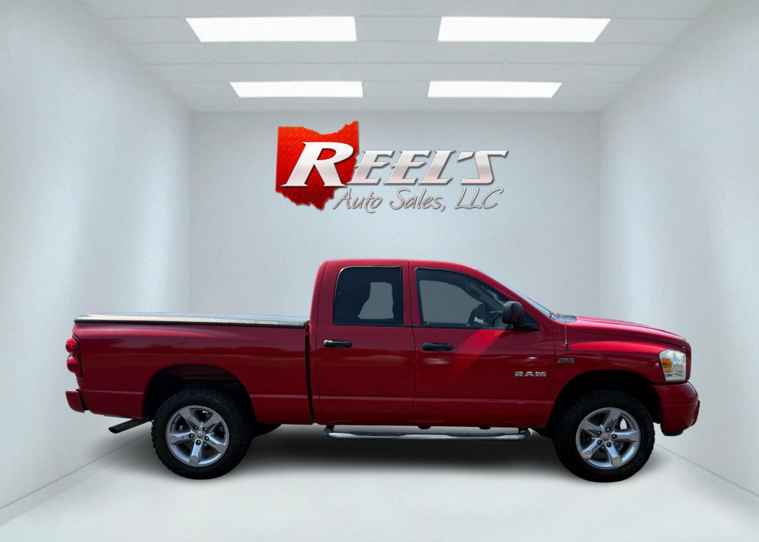 2008 Red /Gray Dodge Ram 1500 SLT Quad Cab 4WD (1D7HU18288S) with an 5.7L V8 OHV 16V engine, 5-Speed Automatic Overdrive transmission, located at 547 E. Main St., Orwell, OH, 44076, (440) 437-5893, 41.535435, -80.847855 - This 2008 Dodge Ram 1500 SLT Quad Cab has spent it's entire life down in Texas. Powered by the 5.7 HEMI V8 engine, 5 speed automatic transmission and 3.93 gearing this truck is rated to tow a respectable 7,450 pounds. On the inside you get a power drivers seat and an aftermarket radio with Bluetooth - Photo#6