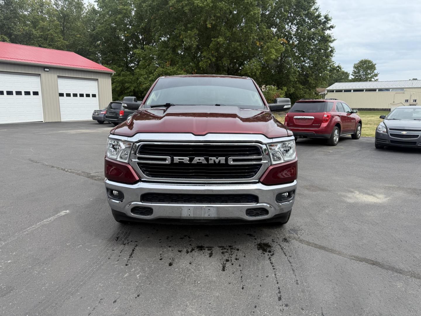 2019 Red /Black RAM 1500 Big Horn Crew Cab SWB 4WD (1C6SRFFTXKN) with an 5.7L V8 OHV 16V engine, Automatic transmission, located at 547 E. Main St., Orwell, OH, 44076, (440) 437-5893, 41.535435, -80.847855 - This 2019 Ram 1500 Big Horn Crew Cab 4WD with a 5.7L HEMI V8 and 8-speed automatic transmission offers robust performance with 395 horsepower and 410 lb-ft of torque, featuring a 3.92 axle ratio for a strong 11,340-pound towing capacity. It balances power with comfort and technology, boasting a 3.5" - Photo#1
