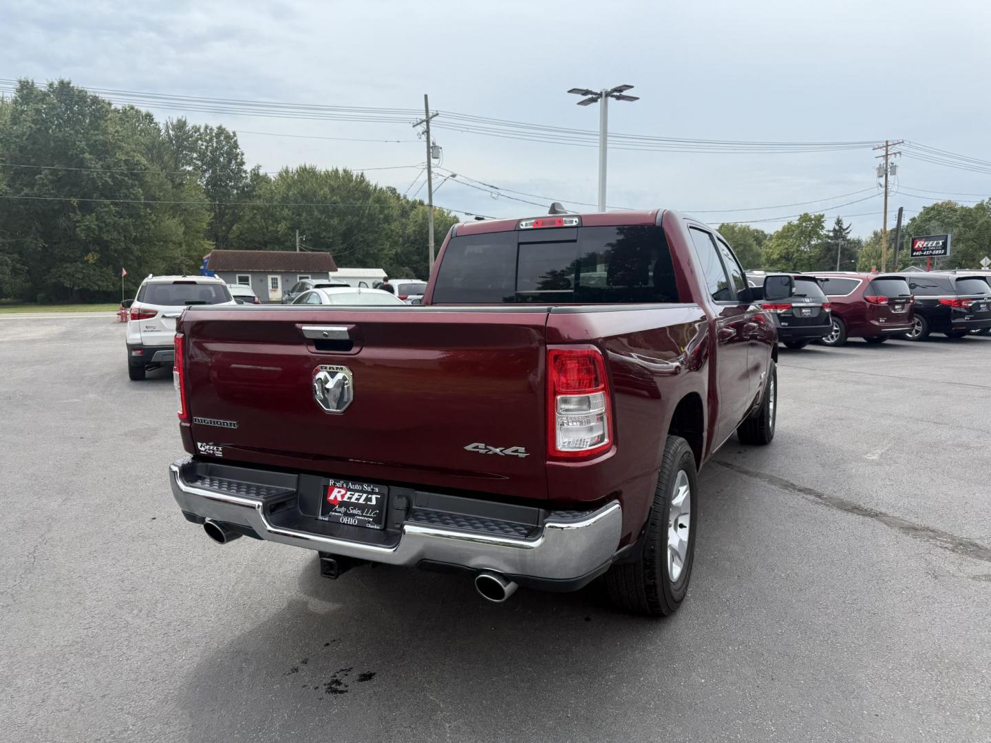 2019 Red /Black RAM 1500 Big Horn Crew Cab SWB 4WD (1C6SRFFTXKN) with an 5.7L V8 OHV 16V engine, Automatic transmission, located at 547 E. Main St., Orwell, OH, 44076, (440) 437-5893, 41.535435, -80.847855 - This 2019 Ram 1500 Big Horn Crew Cab 4WD with a 5.7L HEMI V8 and 8-speed automatic transmission offers robust performance with 395 horsepower and 410 lb-ft of torque, featuring a 3.92 axle ratio for a strong 11,340-pound towing capacity. It balances power with comfort and technology, boasting a 3.5" - Photo#8