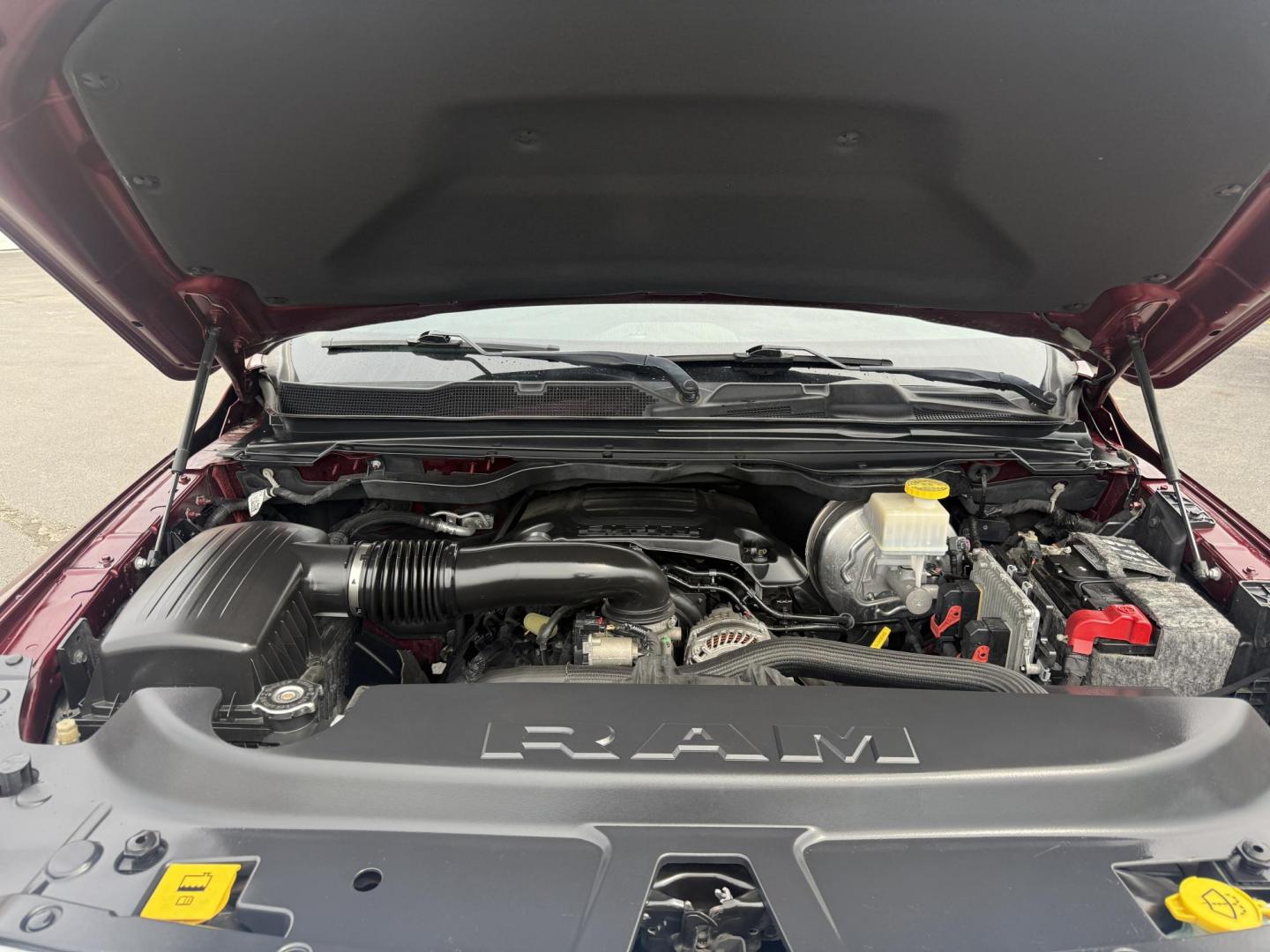 2019 Red /Black RAM 1500 Big Horn Crew Cab SWB 4WD (1C6SRFFTXKN) with an 5.7L V8 OHV 16V engine, Automatic transmission, located at 547 E. Main St., Orwell, OH, 44076, (440) 437-5893, 41.535435, -80.847855 - This 2019 Ram 1500 Big Horn Crew Cab 4WD with a 5.7L HEMI V8 and 8-speed automatic transmission offers robust performance with 395 horsepower and 410 lb-ft of torque, featuring a 3.92 axle ratio for a strong 11,340-pound towing capacity. It balances power with comfort and technology, boasting a 3.5" - Photo#16