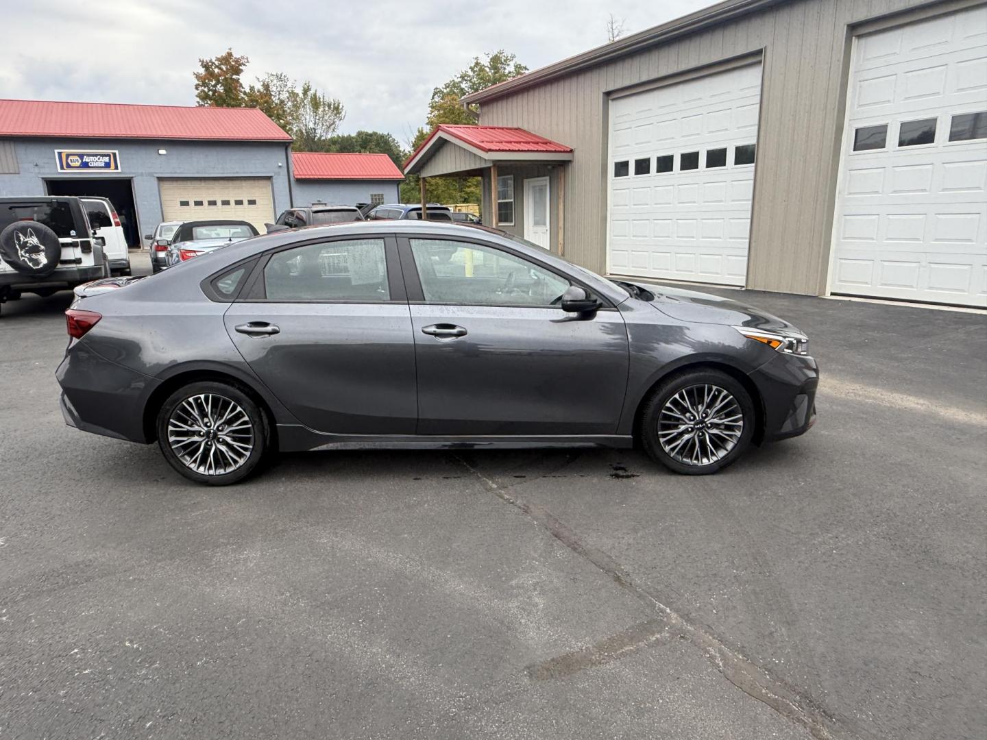 2023 Gray /Black Kia Forte GT Line Auto (3KPF54AD6PE) with an 2.0L I4 DOHC 16V engine, Automatic transmission, located at 11115 Chardon Rd. , Chardon, OH, 44024, (440) 214-9705, 41.580246, -81.241943 - This 2023 Forte GT-Line with the 2.0 MPI engine offers an impressive 39 MPG highway and features full LED exterior lighting, a 4.2" gauge cluster screen, and a 10.25" touchscreen infotainment system with Apple CarPlay, Android Auto, and built-in navigation. Comfort and convenience are enhanced with - Photo#5