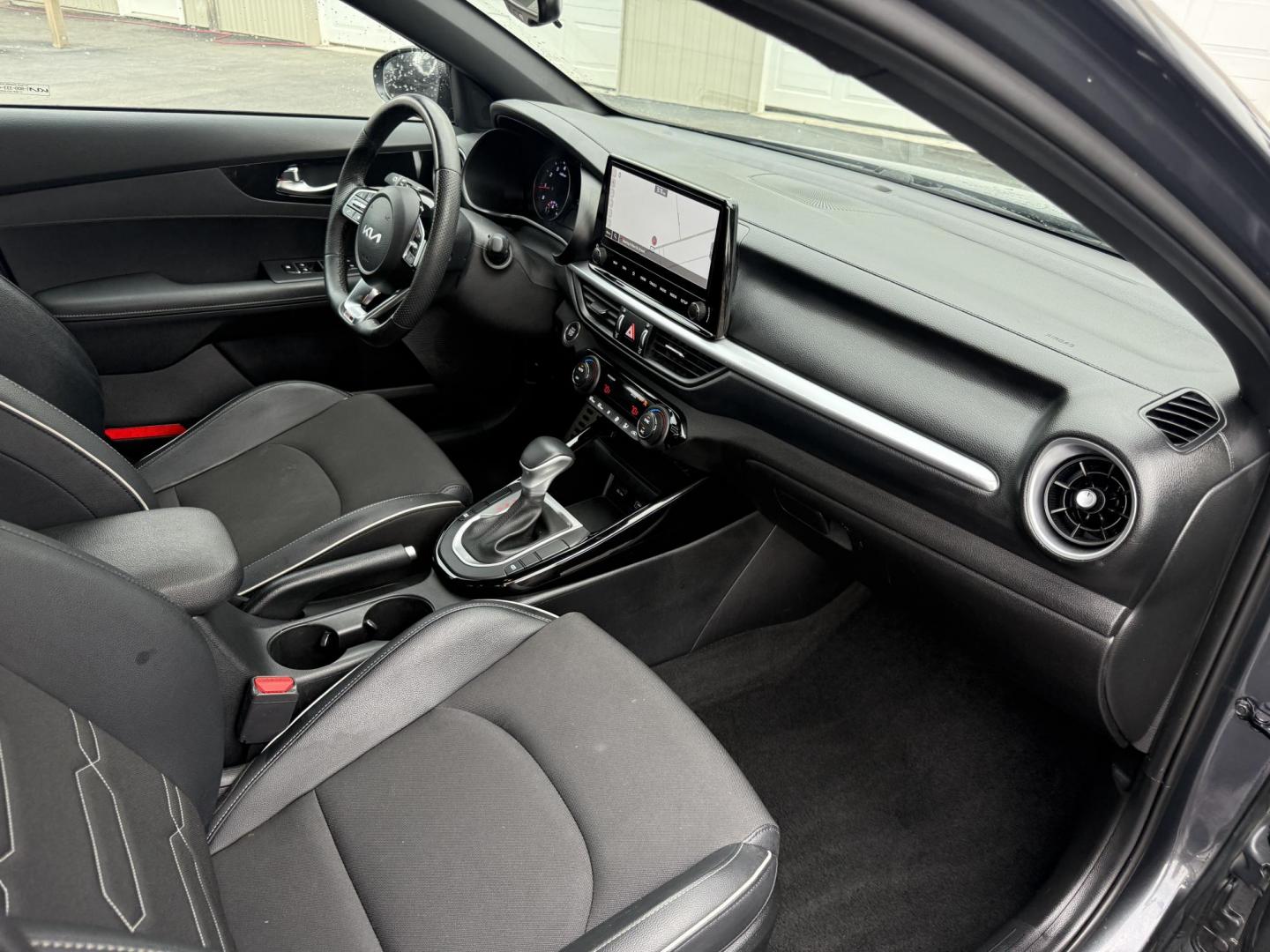 2023 Gray /Black Kia Forte GT Line Auto (3KPF54AD6PE) with an 2.0L I4 DOHC 16V engine, Automatic transmission, located at 11115 Chardon Rd. , Chardon, OH, 44024, (440) 214-9705, 41.580246, -81.241943 - This 2023 Forte GT-Line with the 2.0 MPI engine offers an impressive 39 MPG highway and features full LED exterior lighting, a 4.2" gauge cluster screen, and a 10.25" touchscreen infotainment system with Apple CarPlay, Android Auto, and built-in navigation. Comfort and convenience are enhanced with - Photo#42