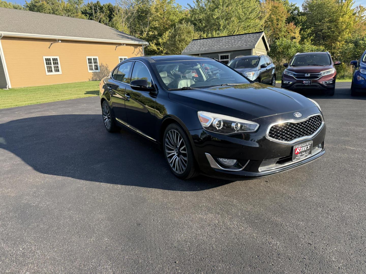 2015 Black /Black Kia Cadenza Premium (KNALN4D72F5) with an 3.3L V6 DOHC 24V engine, 6-Speed Automatic transmission, located at 11115 Chardon Rd. , Chardon, OH, 44024, (440) 214-9705, 41.580246, -81.241943 - This 2015 Kia Cadenza Premium offers a refined driving experience with its 3.3L V6 engine and 6-speed automatic transmission, achieving up to 28 MPG on the highway. Its upscale interior features Nappa leather, heated and cooled power front seats, heated rear seats, dual-zone automatic climate contro - Photo#2